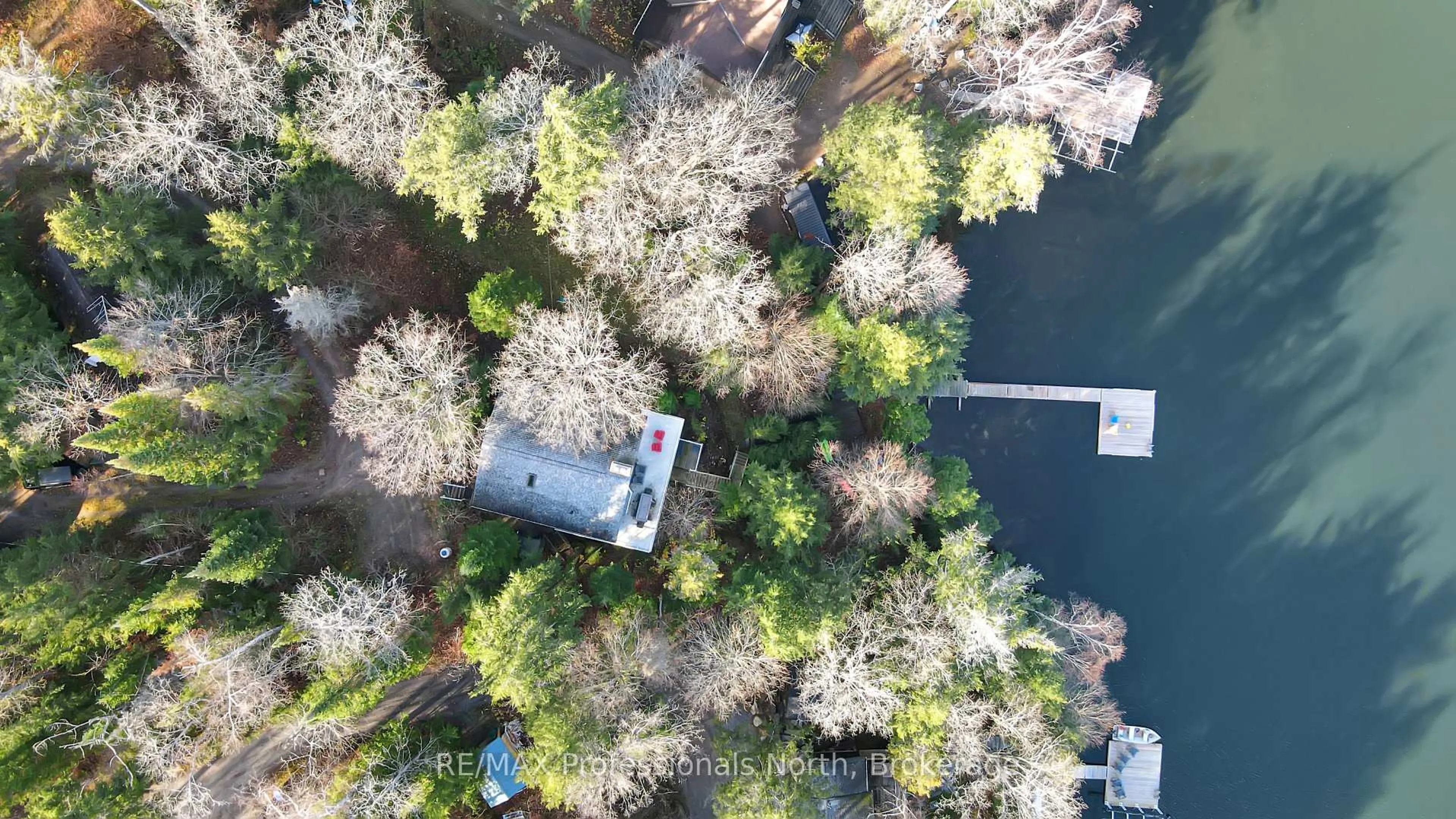 A pic from outside/outdoor area/front of a property/back of a property/a pic from drone, water/lake/river/ocean view for 1171 STRAGGLE LAKE Dr, Dysart et al Ontario K0L 1M1