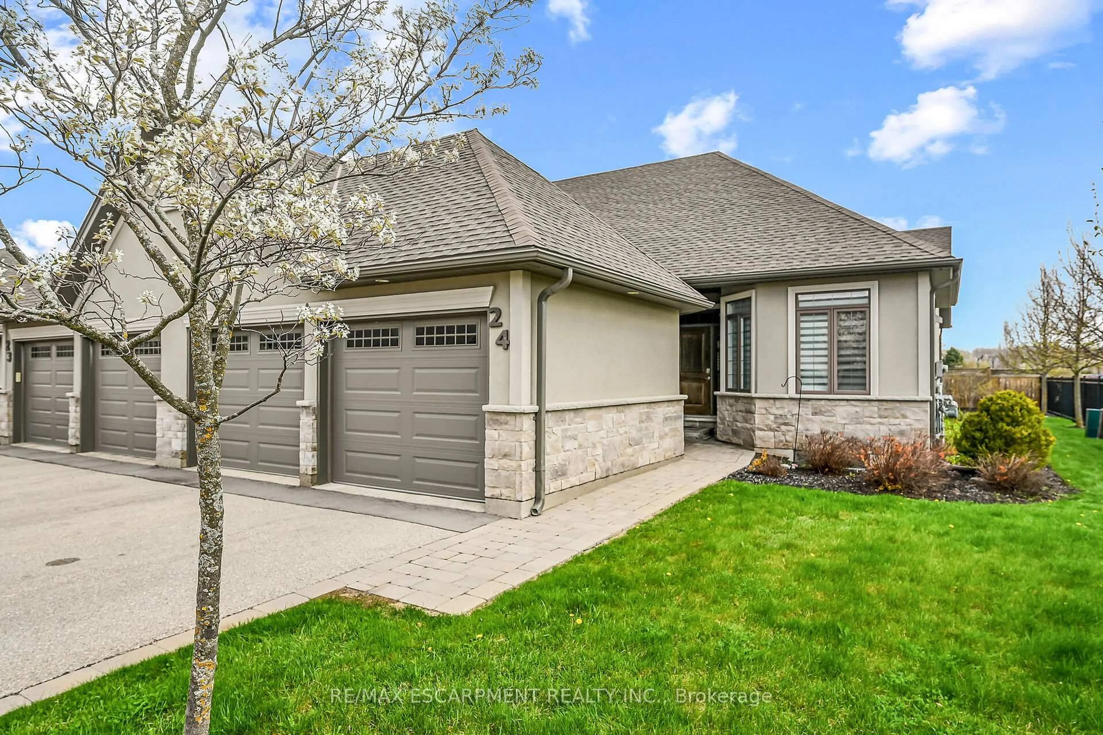 Home with brick exterior material, street for 247 Munnoch Blvd #24, Woodstock Ontario N4T 0K2