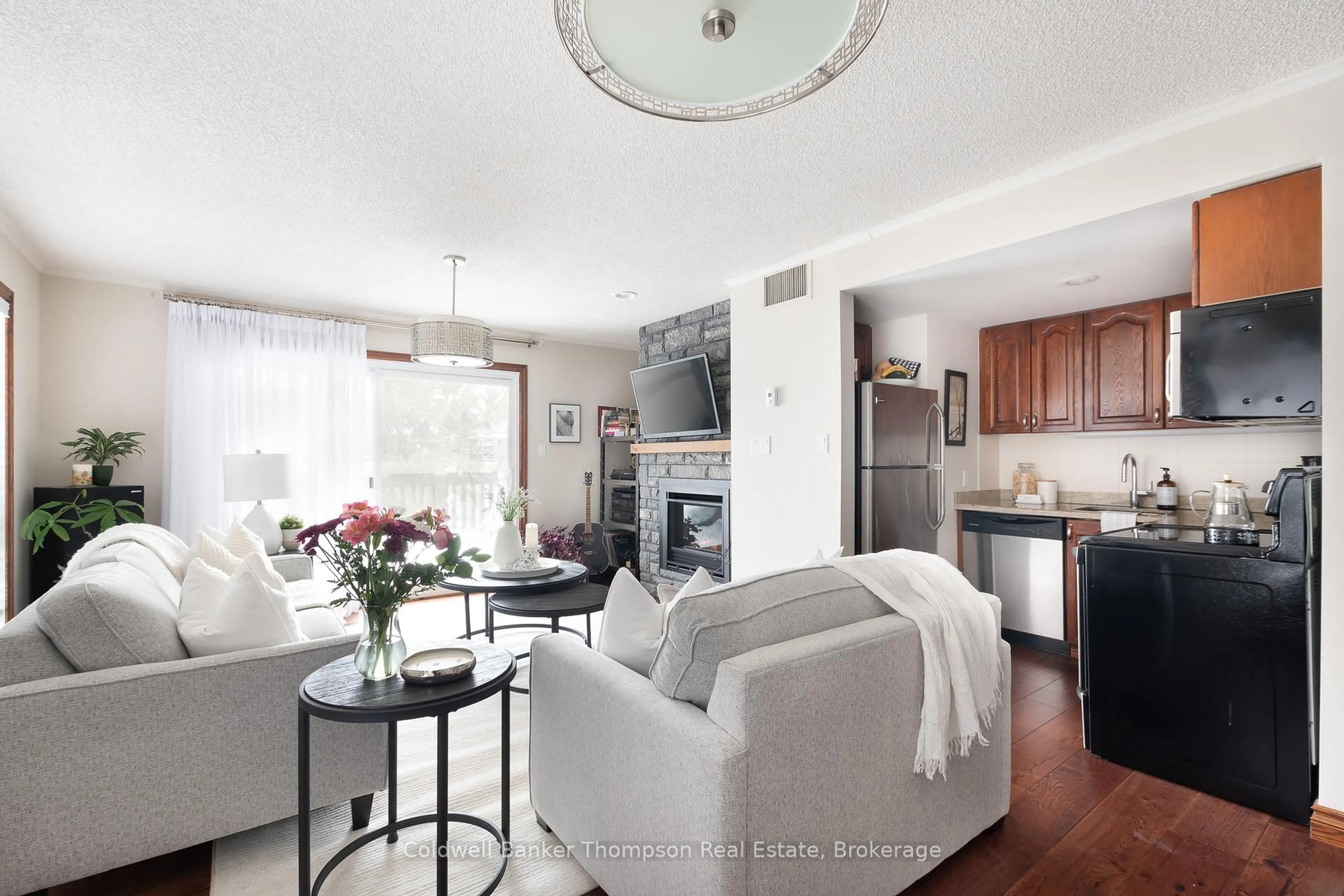 Living room with furniture, unknown for 34 Deerhurst Greens Rd #301, Huntsville Ontario P1H 1A9