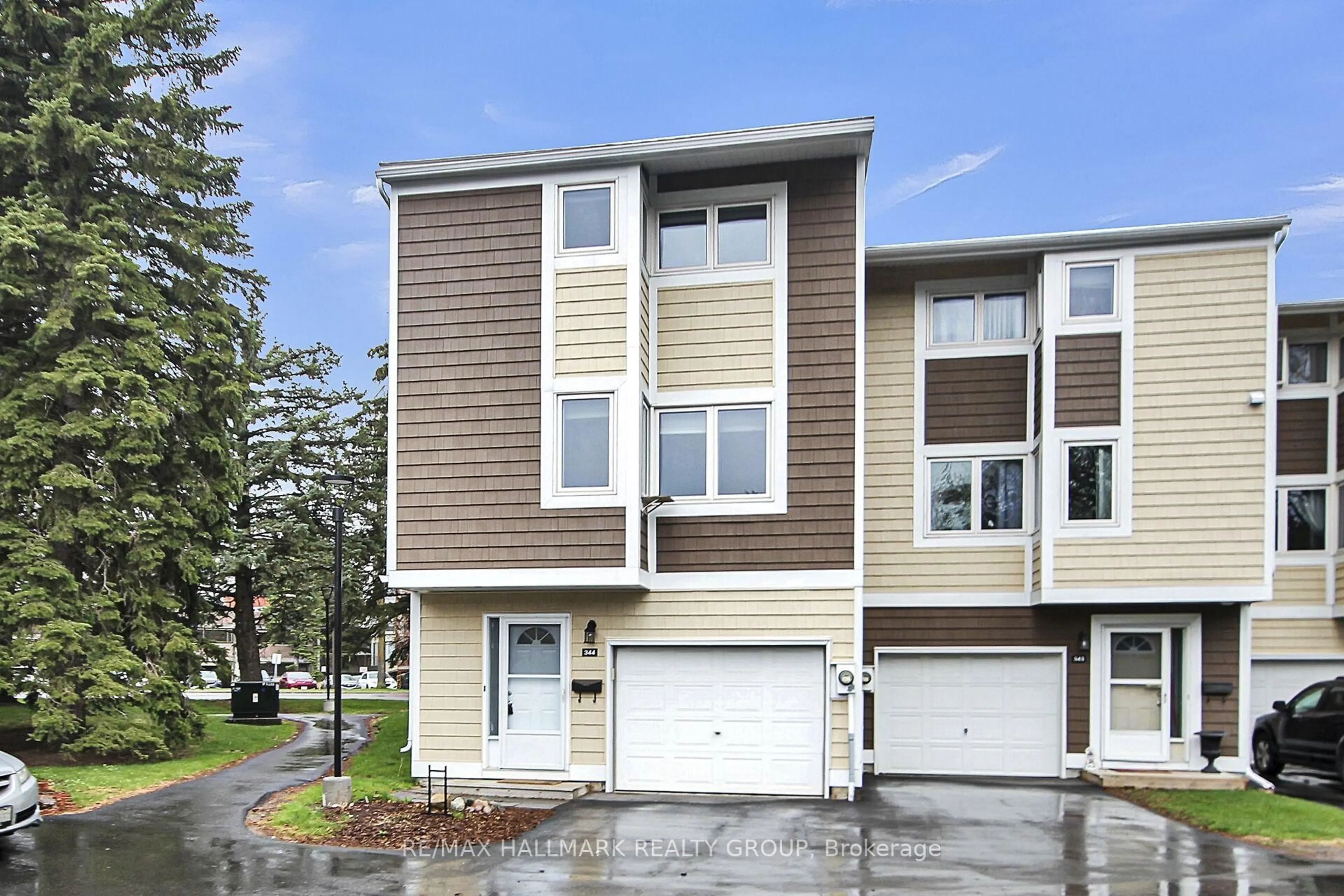 Home with vinyl exterior material, street for 344 Stowe Crt, Ottawa Ontario K2K 1Z6