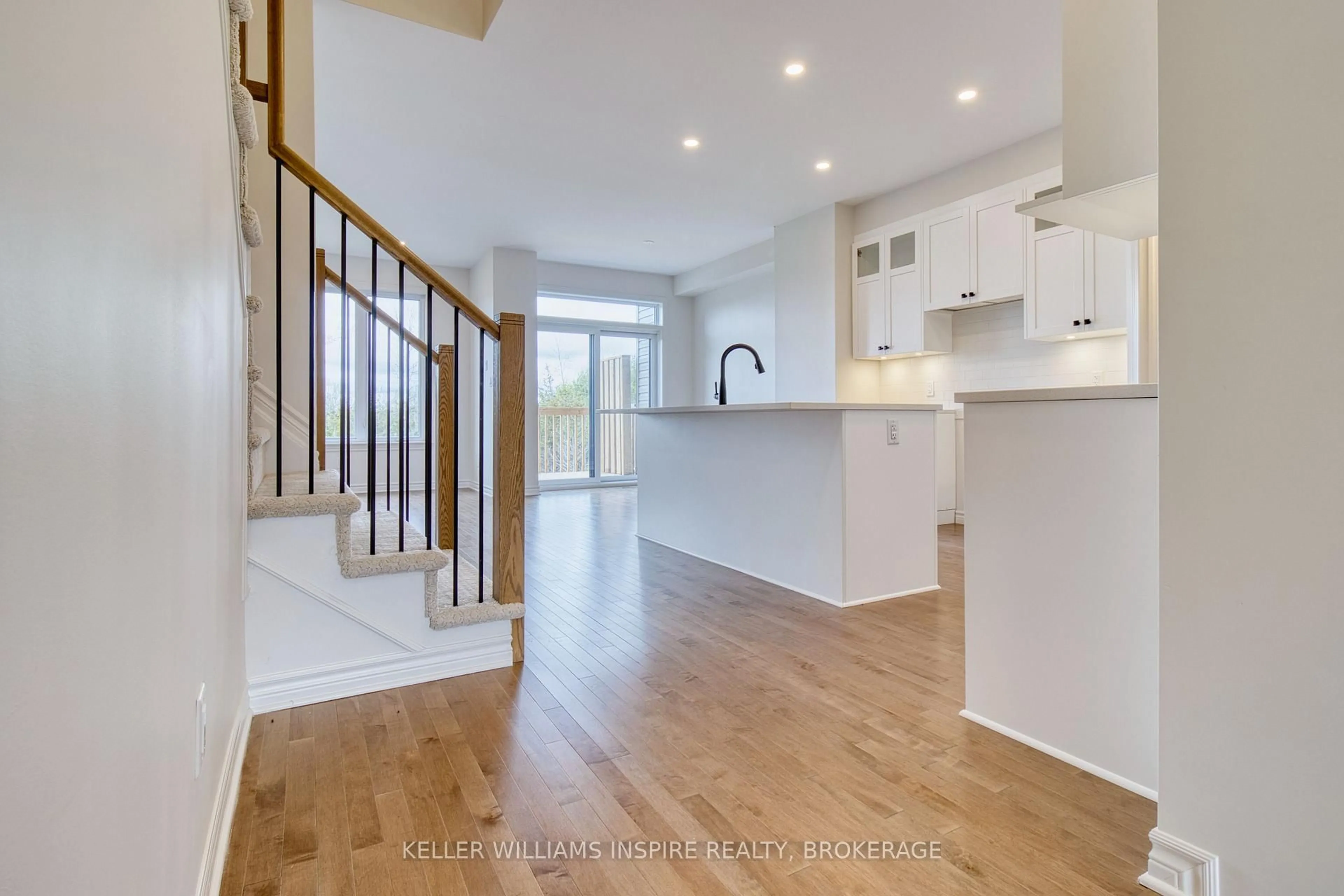 Open concept kitchen, wood/laminate floor for 456 Buckthorn Ave, Kingston Ontario K7P 0V6