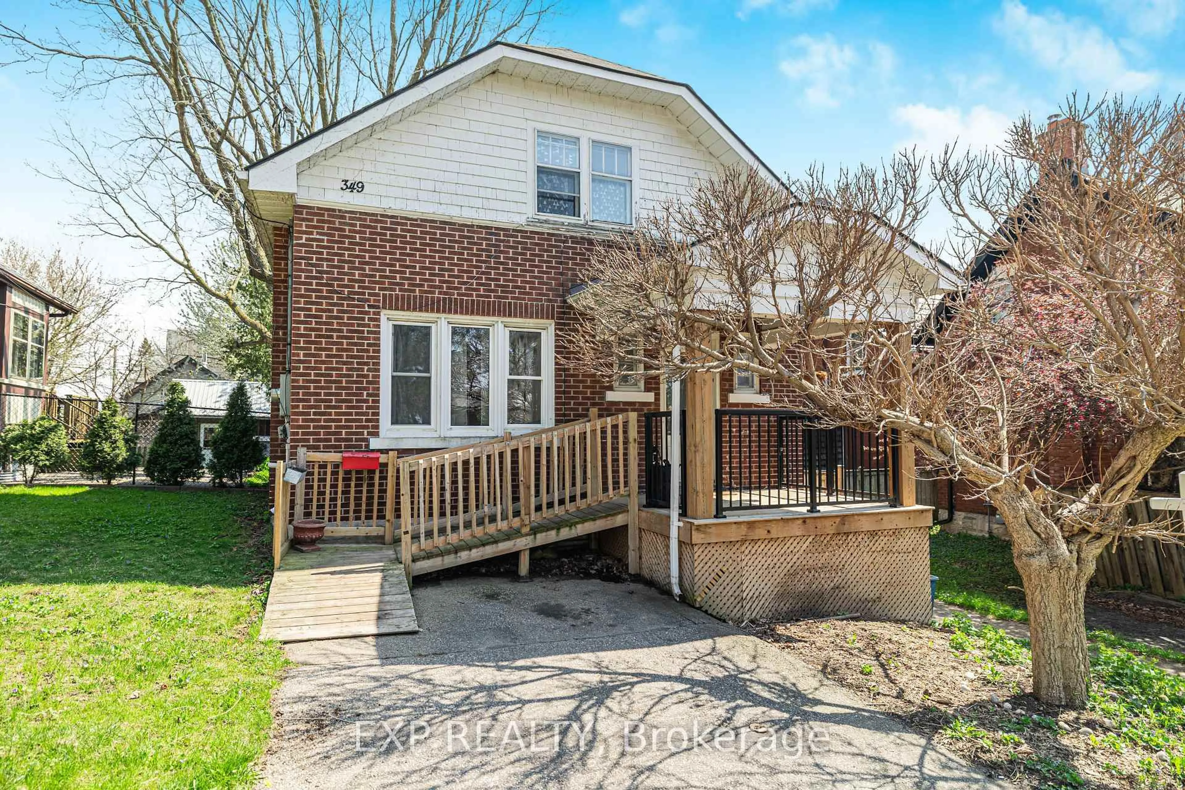 Home with brick exterior material, street for 349 Luella St, Kitchener Ontario N2H 2J3
