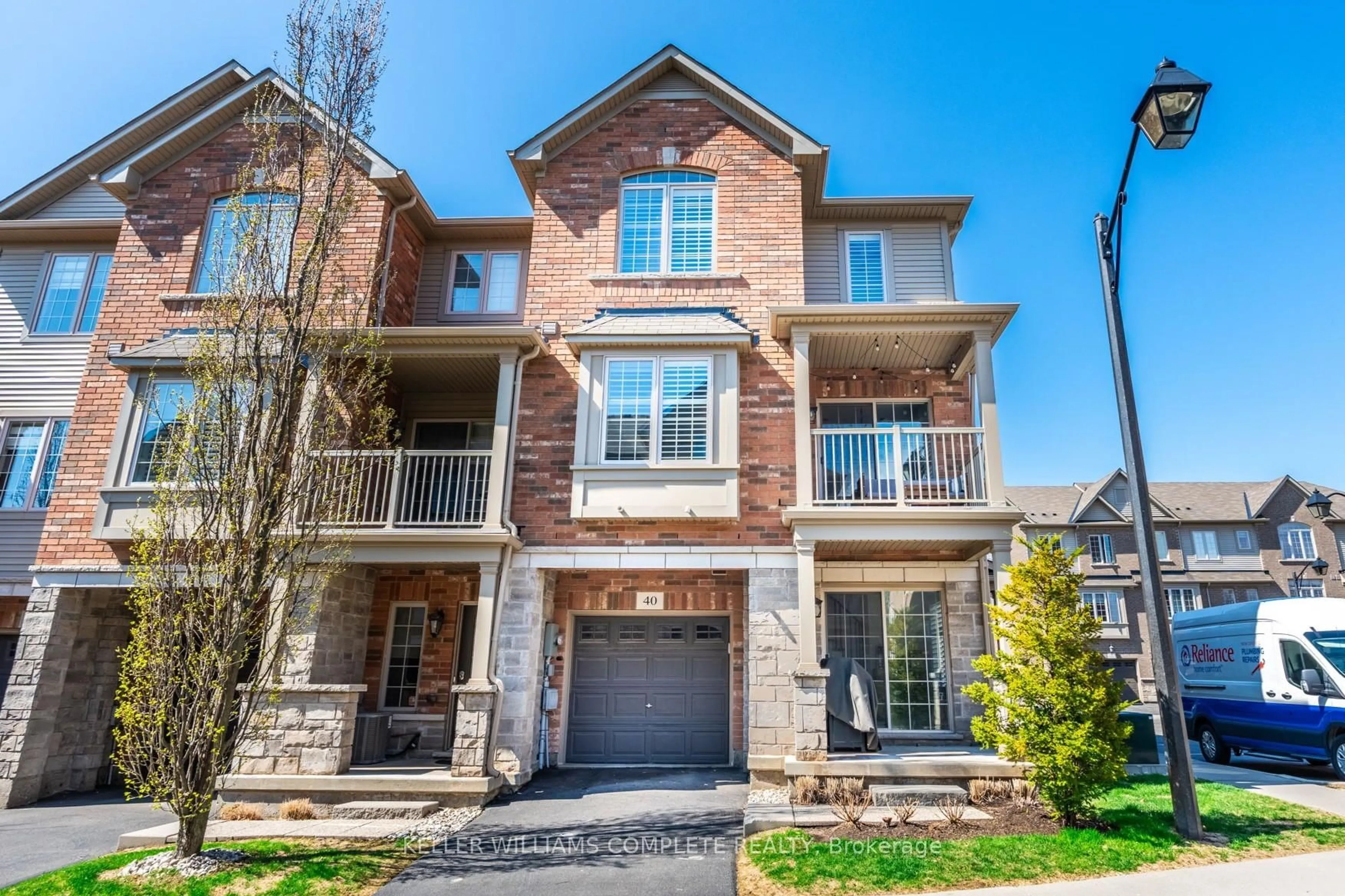 Home with brick exterior material, street for 257 Parkside Dr #40, Hamilton Ontario L8B 0W5