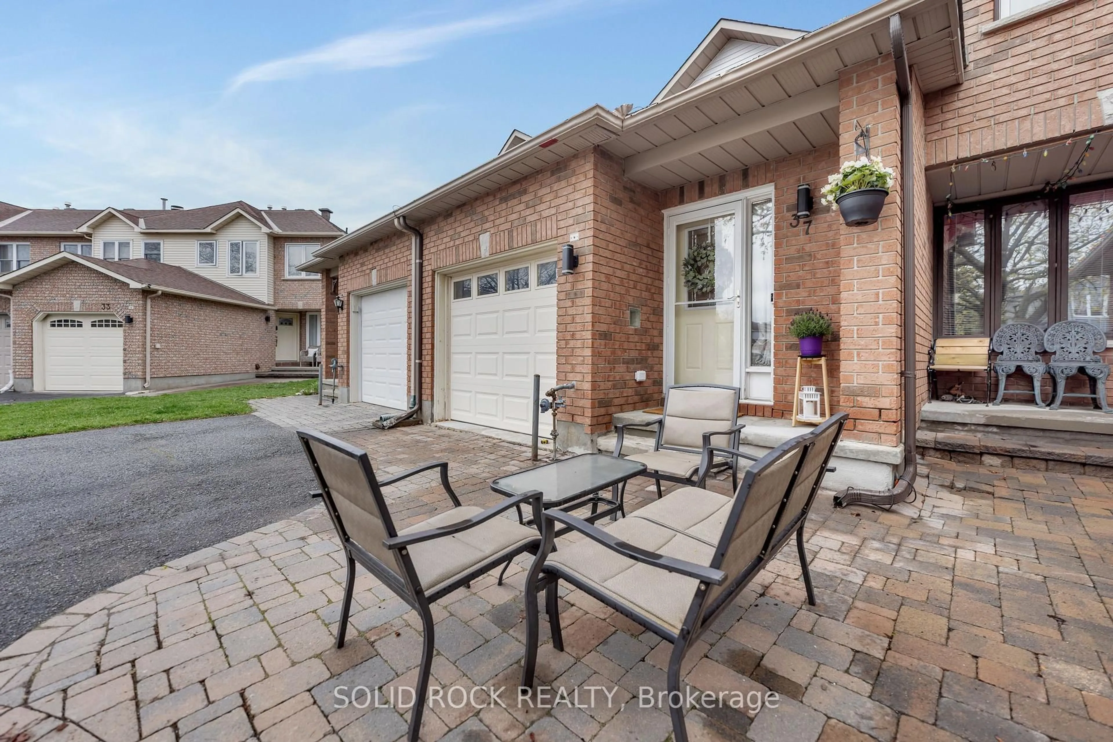 Home with brick exterior material, street for 37 Grenadier Way, Ottawa Ontario K2J 4L3