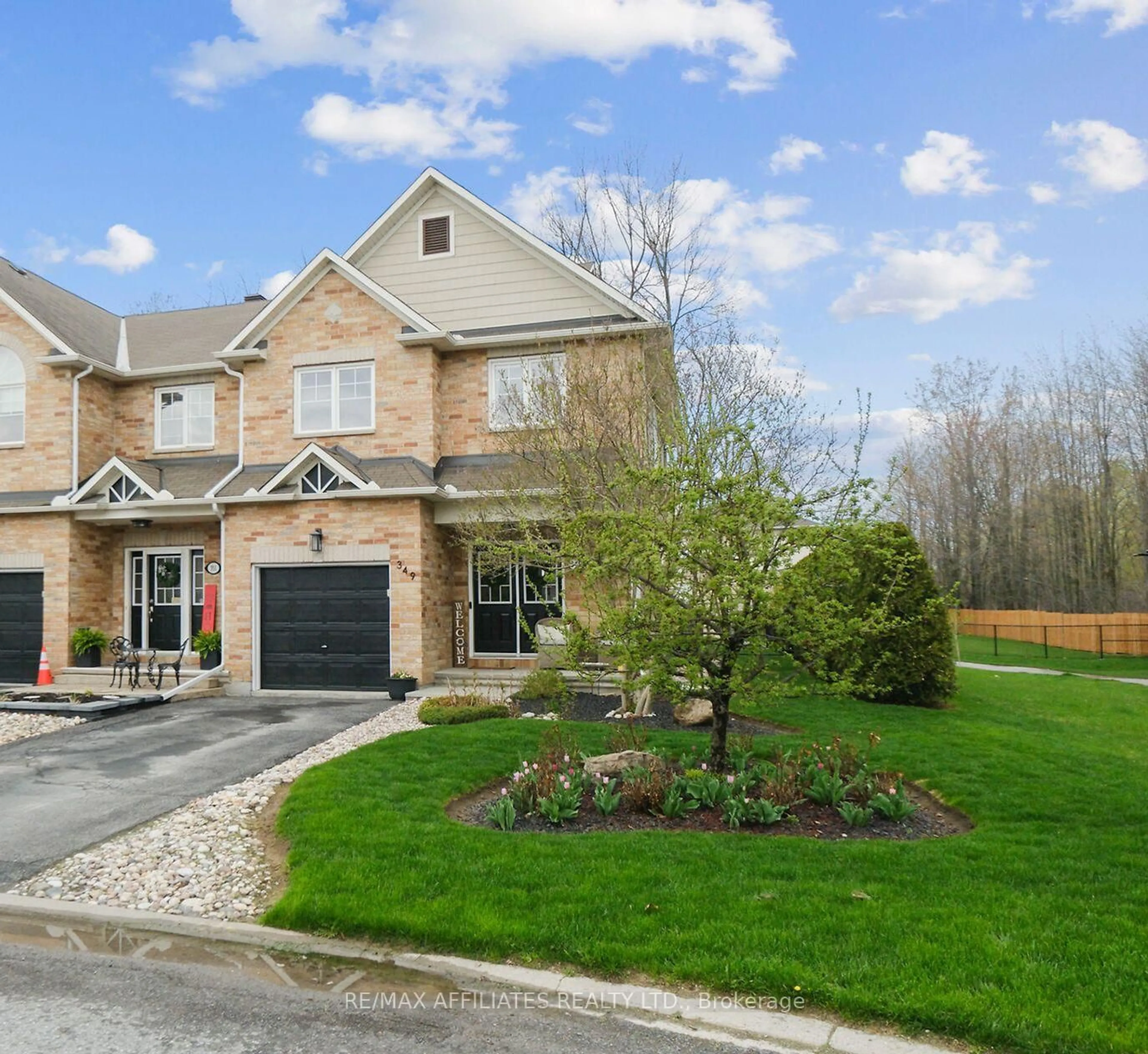 Home with brick exterior material, street for 349 Celtic Ridge Cres, Ottawa Ontario K2W 0B6