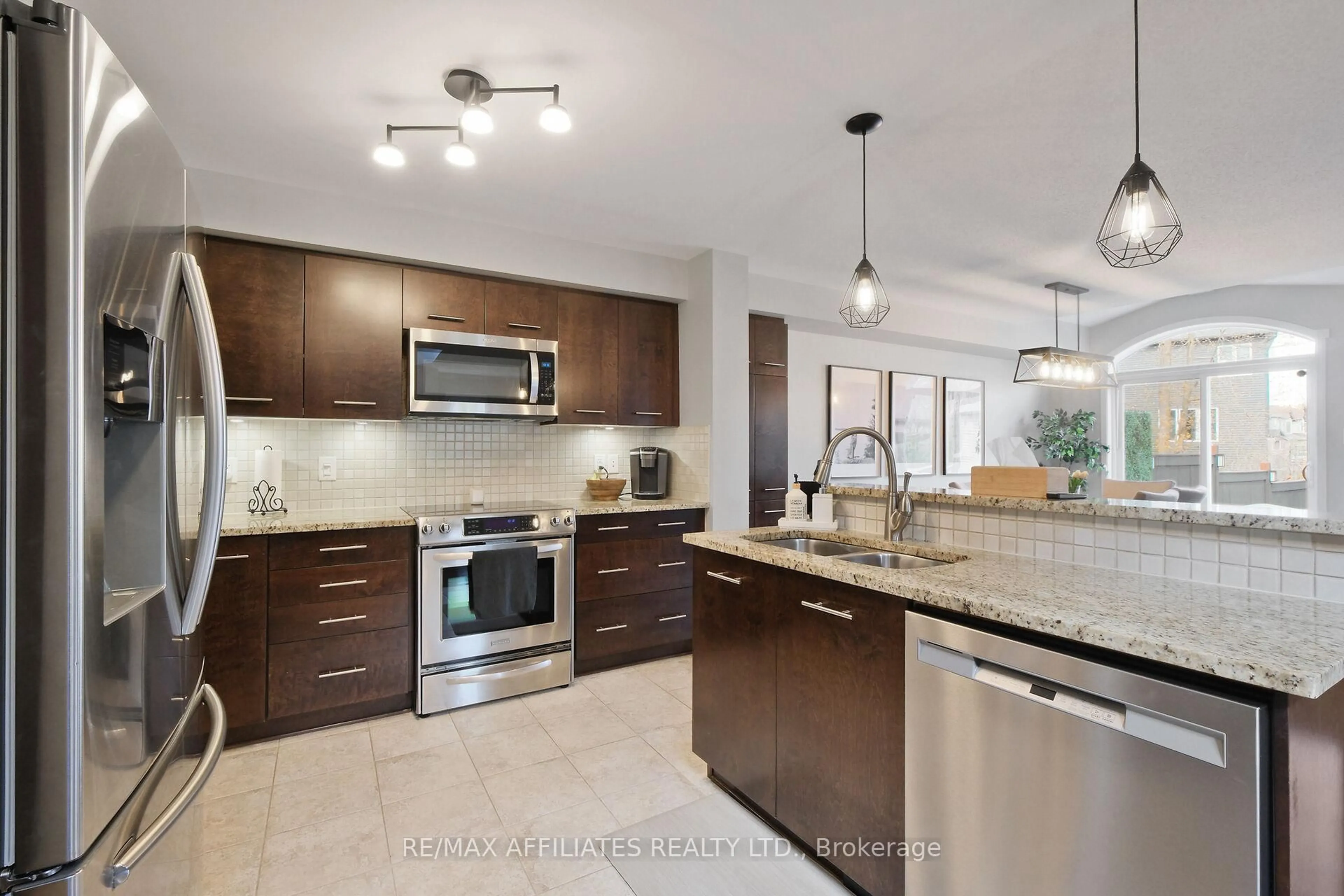 Open concept kitchen, ceramic/tile floor for 349 Celtic Ridge Cres, Ottawa Ontario K2W 0B6