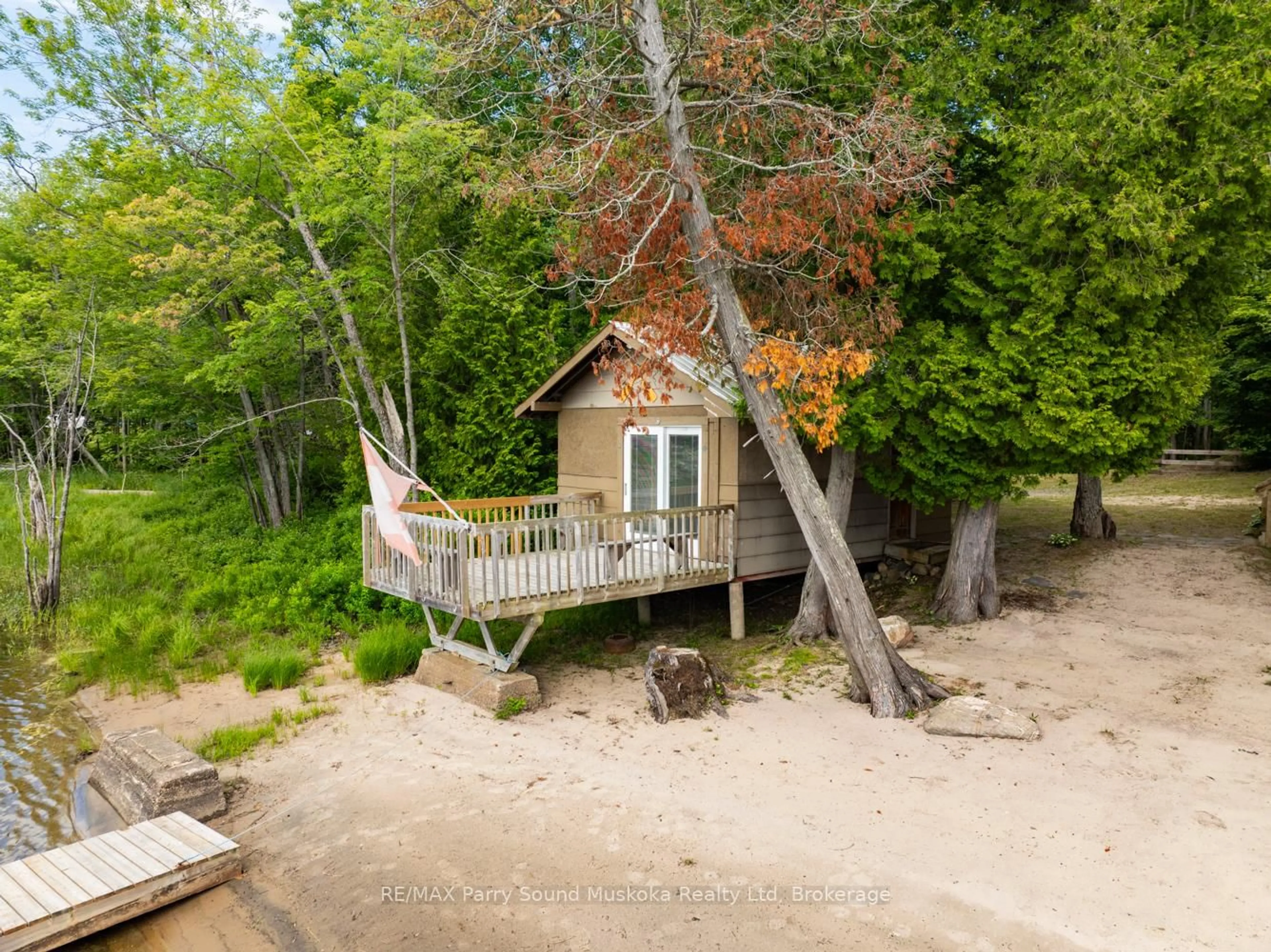 A pic from outside/outdoor area/front of a property/back of a property/a pic from drone, forest/trees view for 3 Macey Dr, Whitestone Ontario P0A 1G0