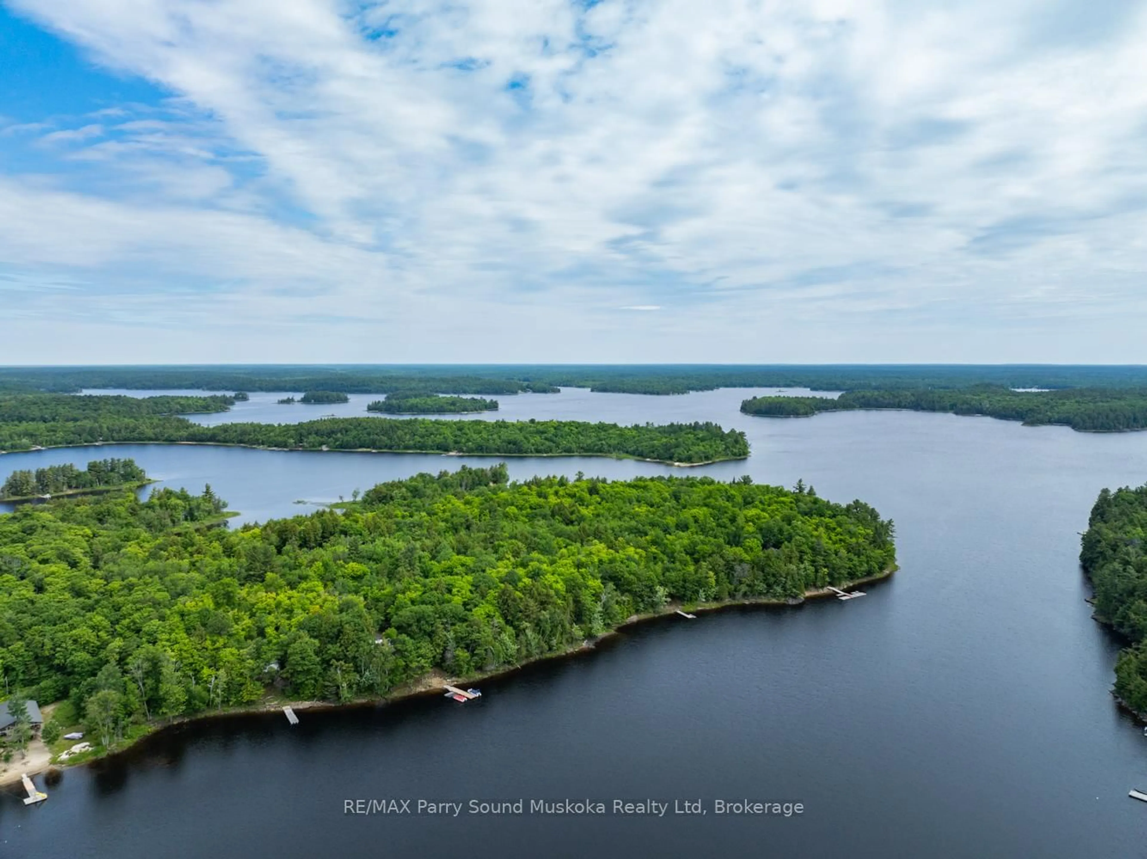 A pic from outside/outdoor area/front of a property/back of a property/a pic from drone, water/lake/river/ocean view for 3 Macey Dr, Whitestone Ontario P0A 1G0