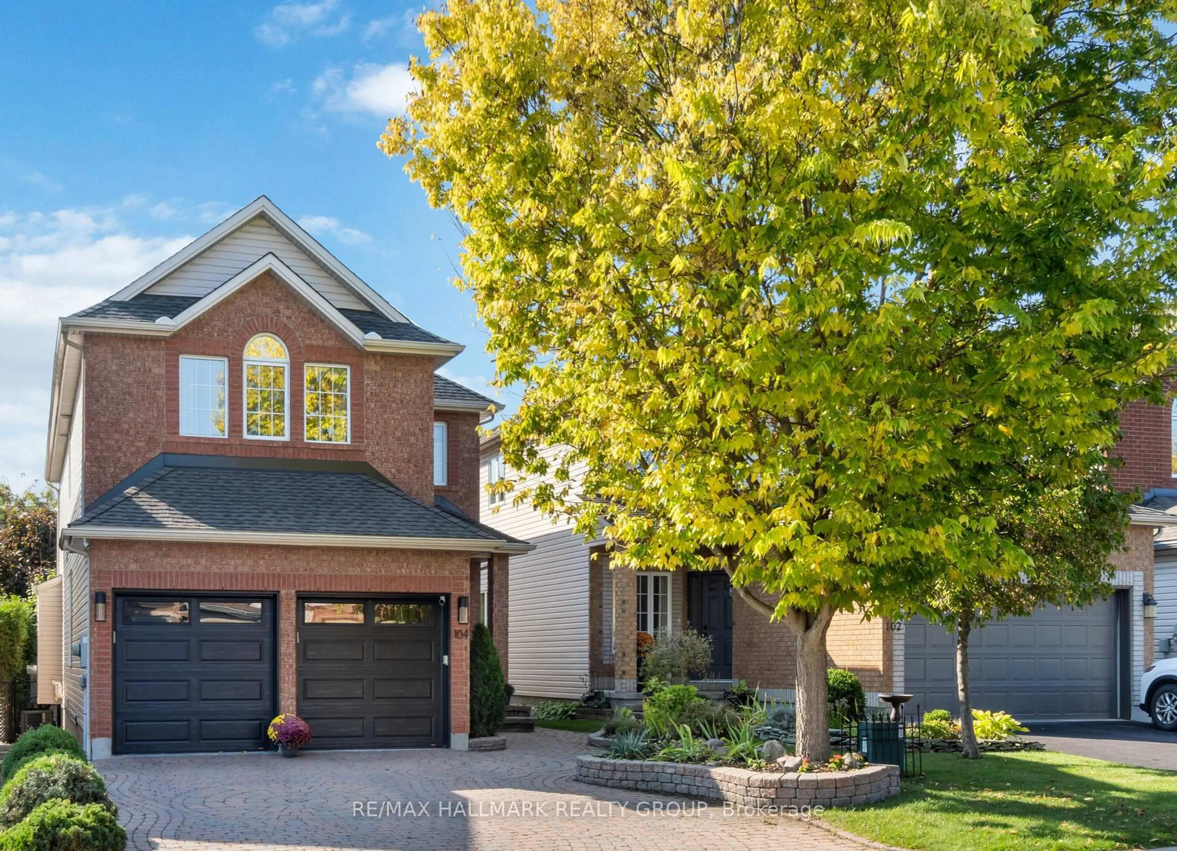 Home with brick exterior material, street for 104 Meadowcroft Cres, Ottawa Ontario K1J 1H1