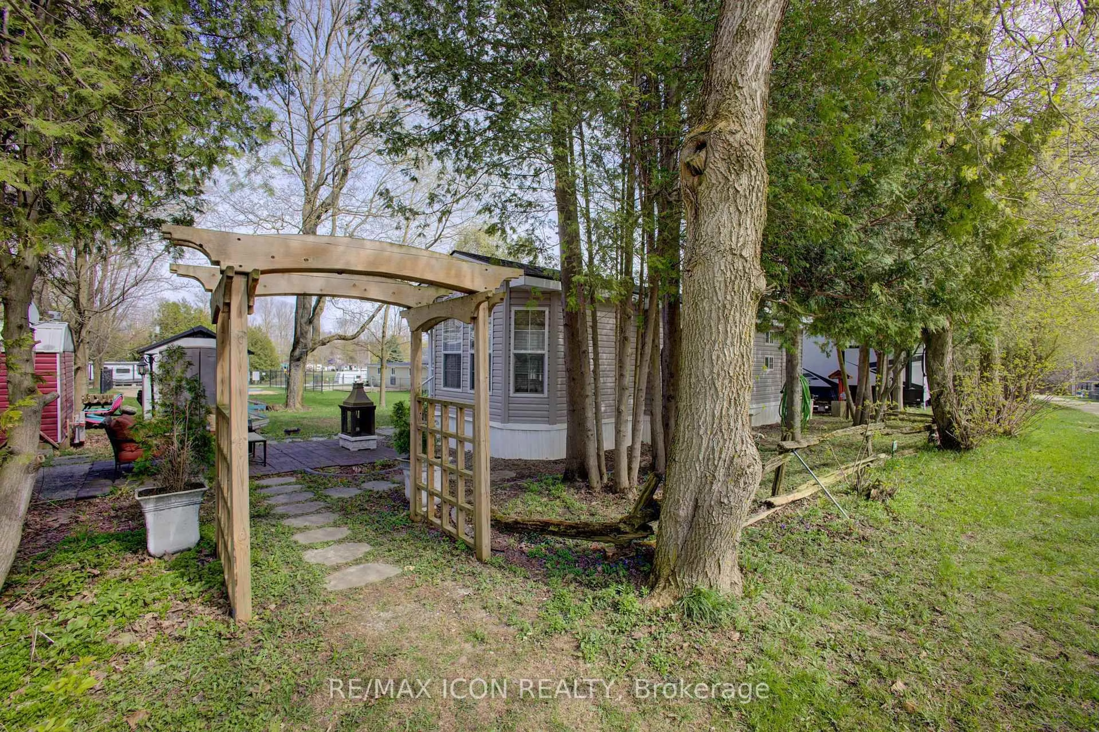 A pic from outside/outdoor area/front of a property/back of a property/a pic from drone, forest/trees view for 8 Maple N/A, Wellington North Ontario N0G 2L0
