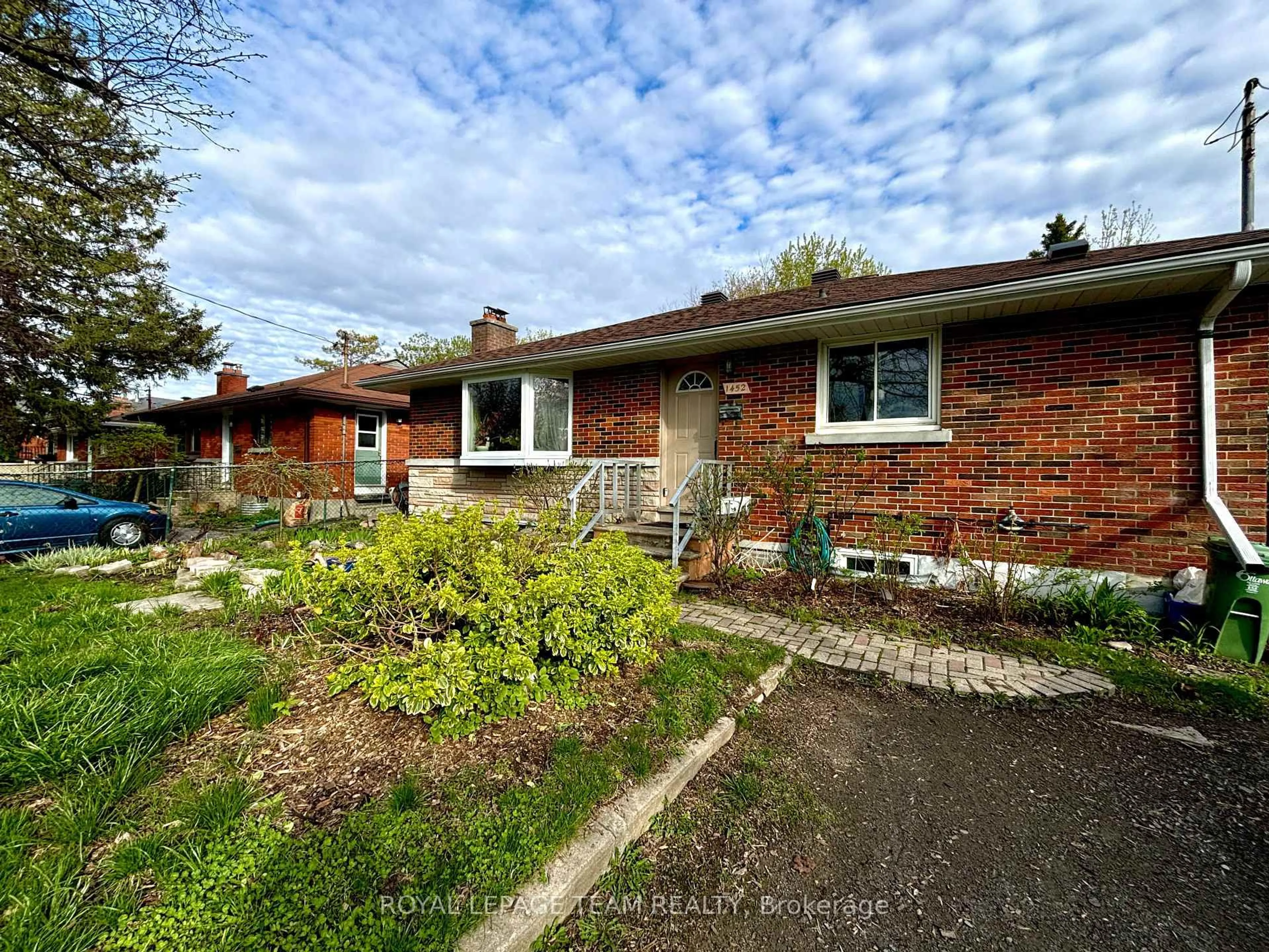 Home with brick exterior material, street for 1452 Chatelain Ave, Ottawa Ontario K1Z 8B1