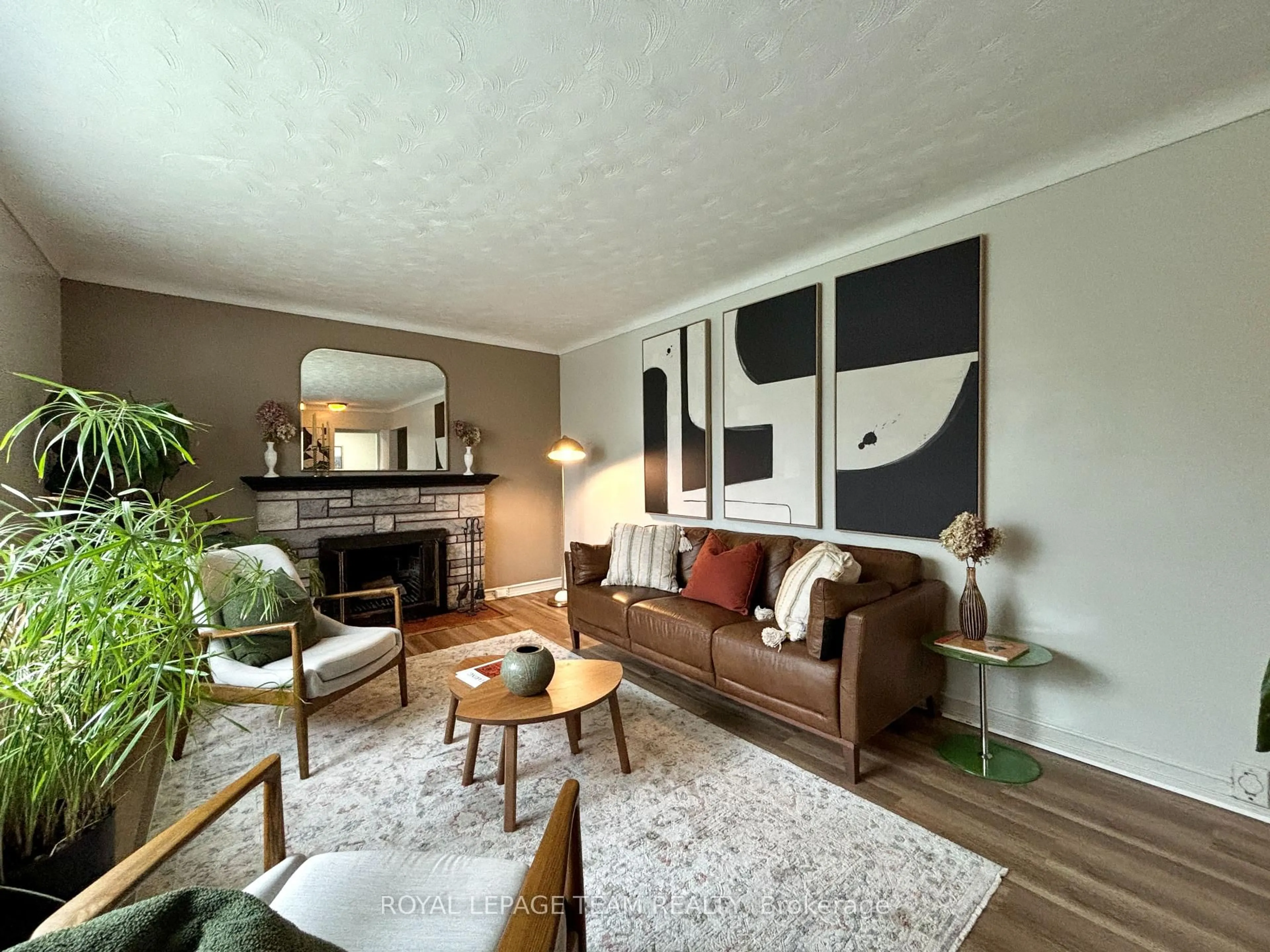 Living room with furniture, wood/laminate floor for 1452 Chatelain Ave, Ottawa Ontario K1Z 8B1