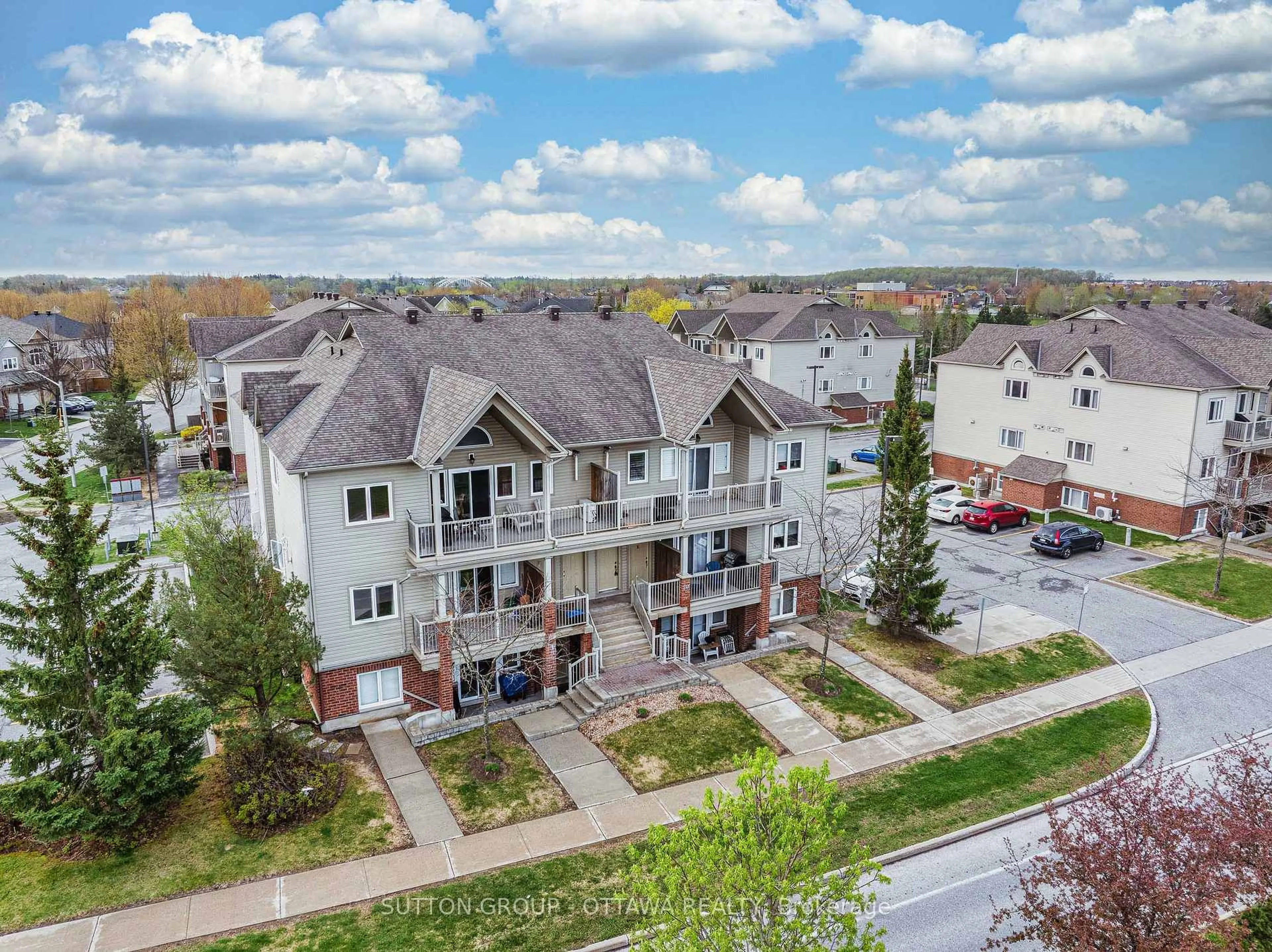 A pic from outside/outdoor area/front of a property/back of a property/a pic from drone, unknown for 241 Crestway Dr #F, Ottawa Ontario K2G 0A9