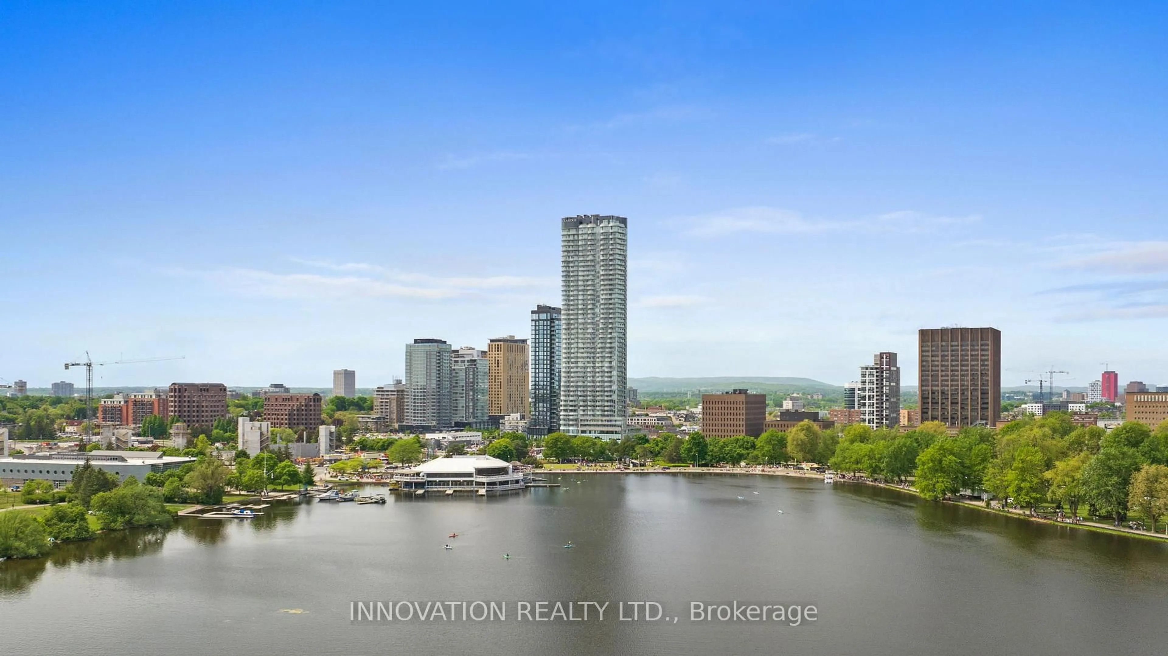 A pic from outside/outdoor area/front of a property/back of a property/a pic from drone, water/lake/river/ocean view for 805 Carling Ave #701, Ottawa Ontario K1S 5W9