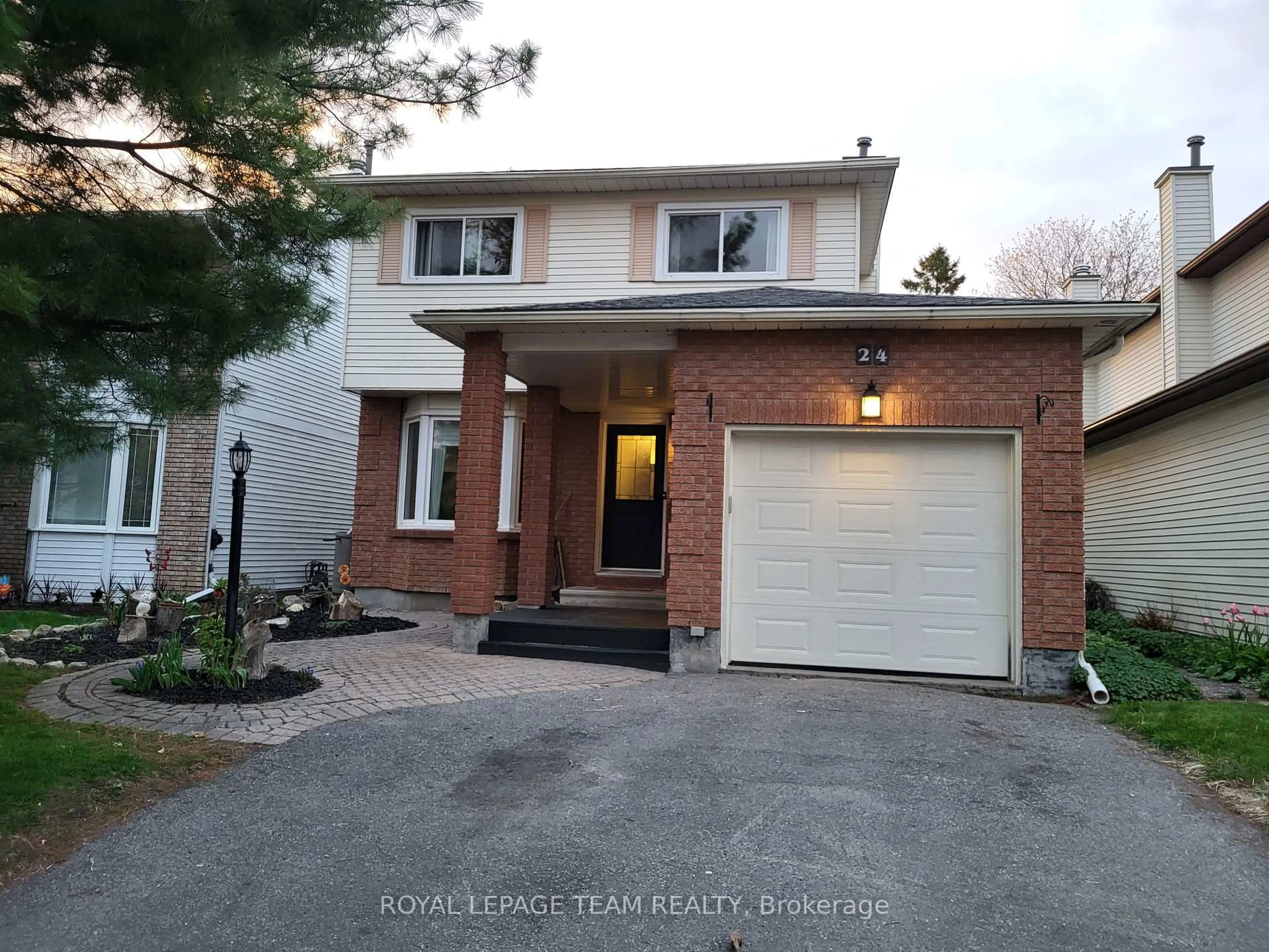 Home with brick exterior material, street for 24 Ready Way, Ottawa Ontario K2J 2R6