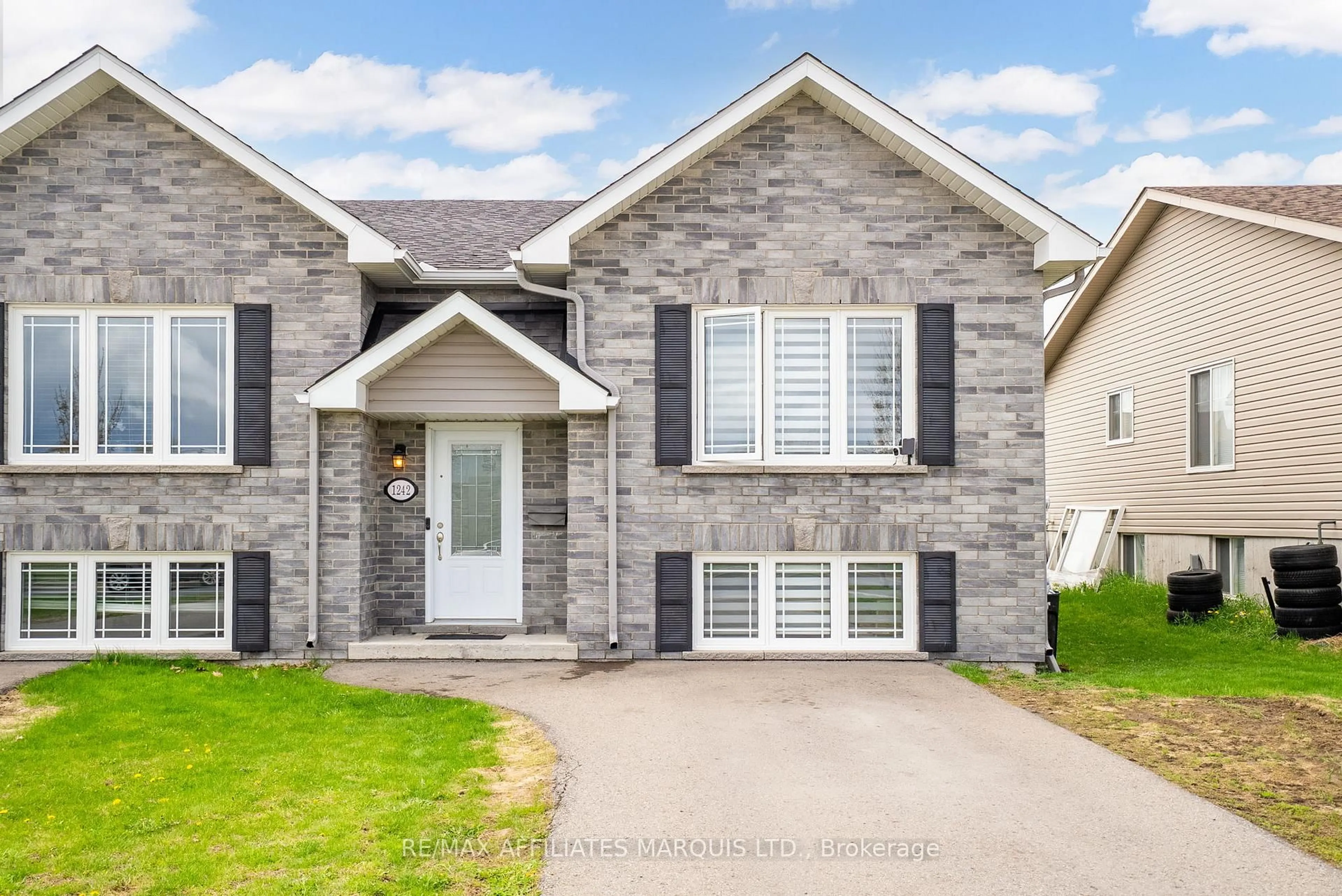 Home with brick exterior material, street for 1242 St Michel Ave, Cornwall Ontario K6H 0E9