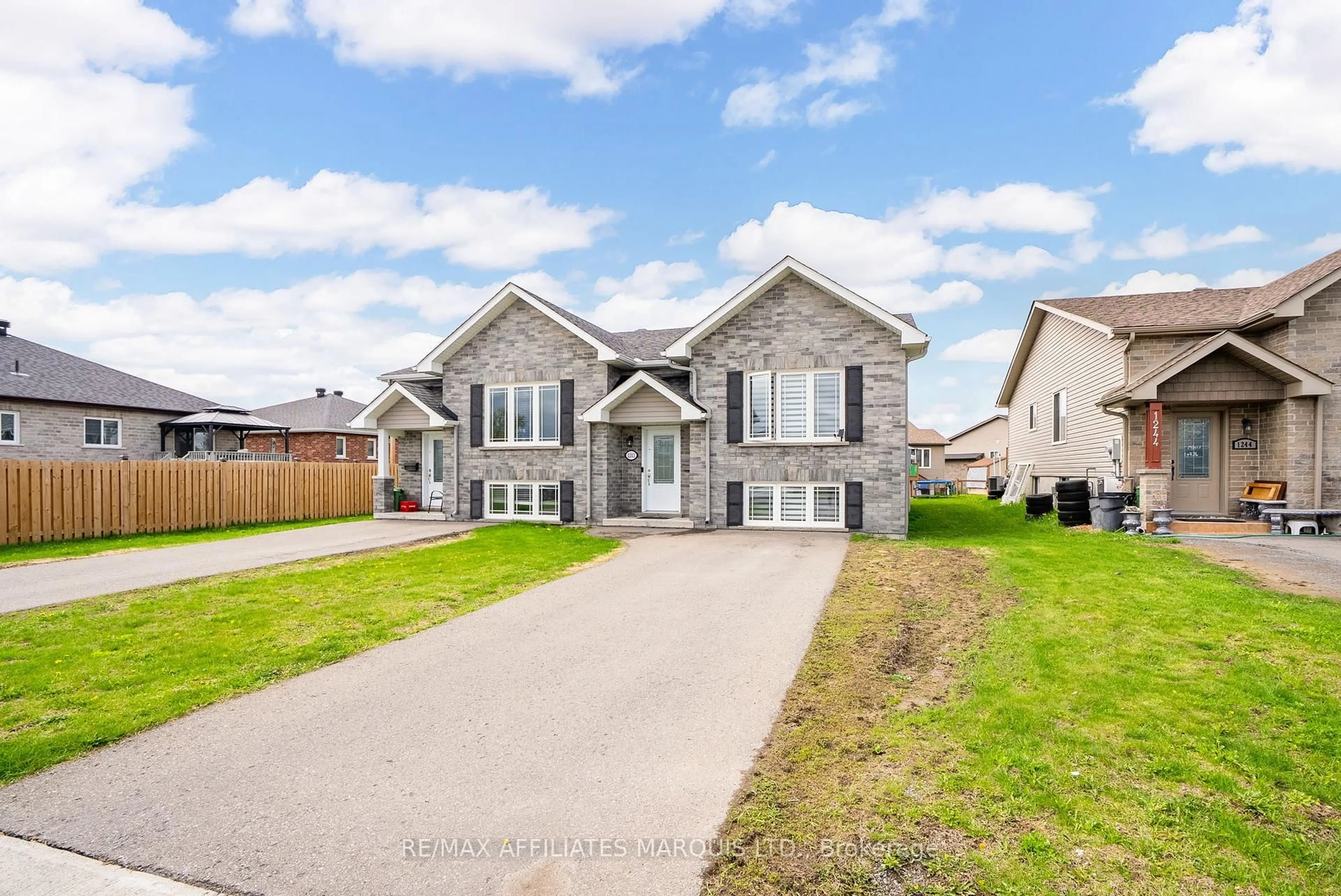 Home with brick exterior material, street for 1242 St Michel Ave, Cornwall Ontario K6H 0E9