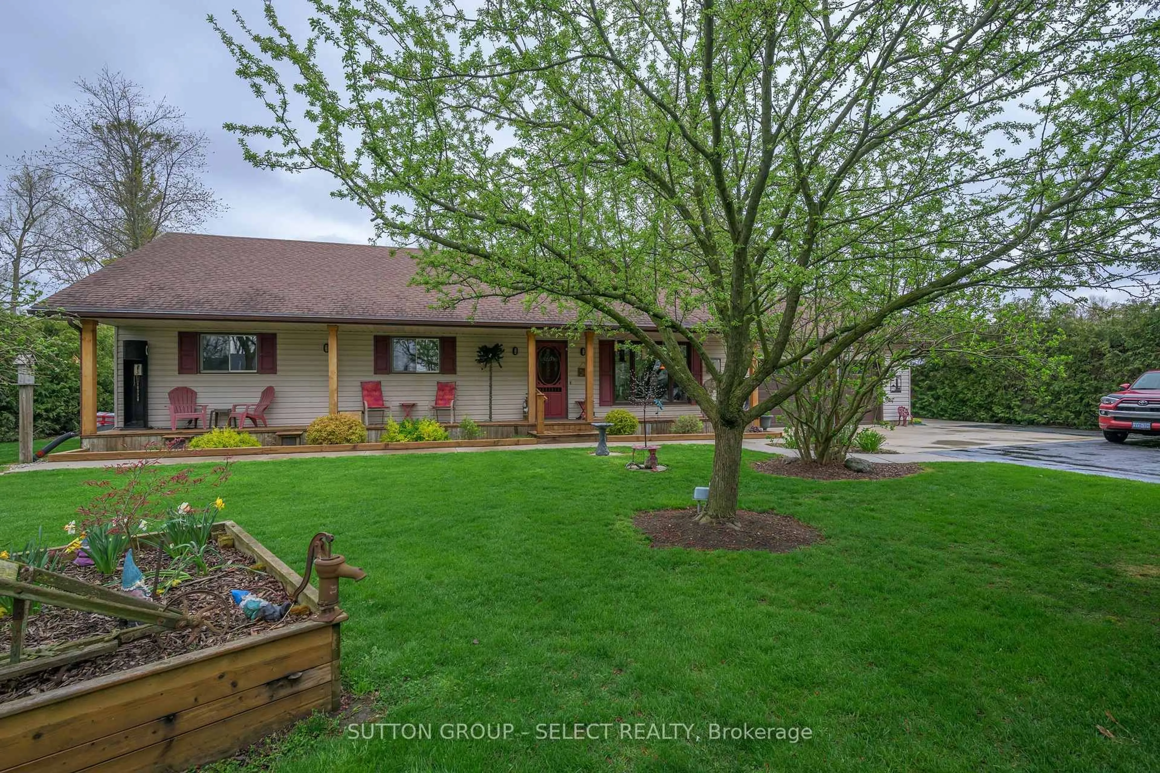 A pic from outside/outdoor area/front of a property/back of a property/a pic from drone, street for 8444 Lazy Lane, Lambton Shores Ontario N0M 2N0