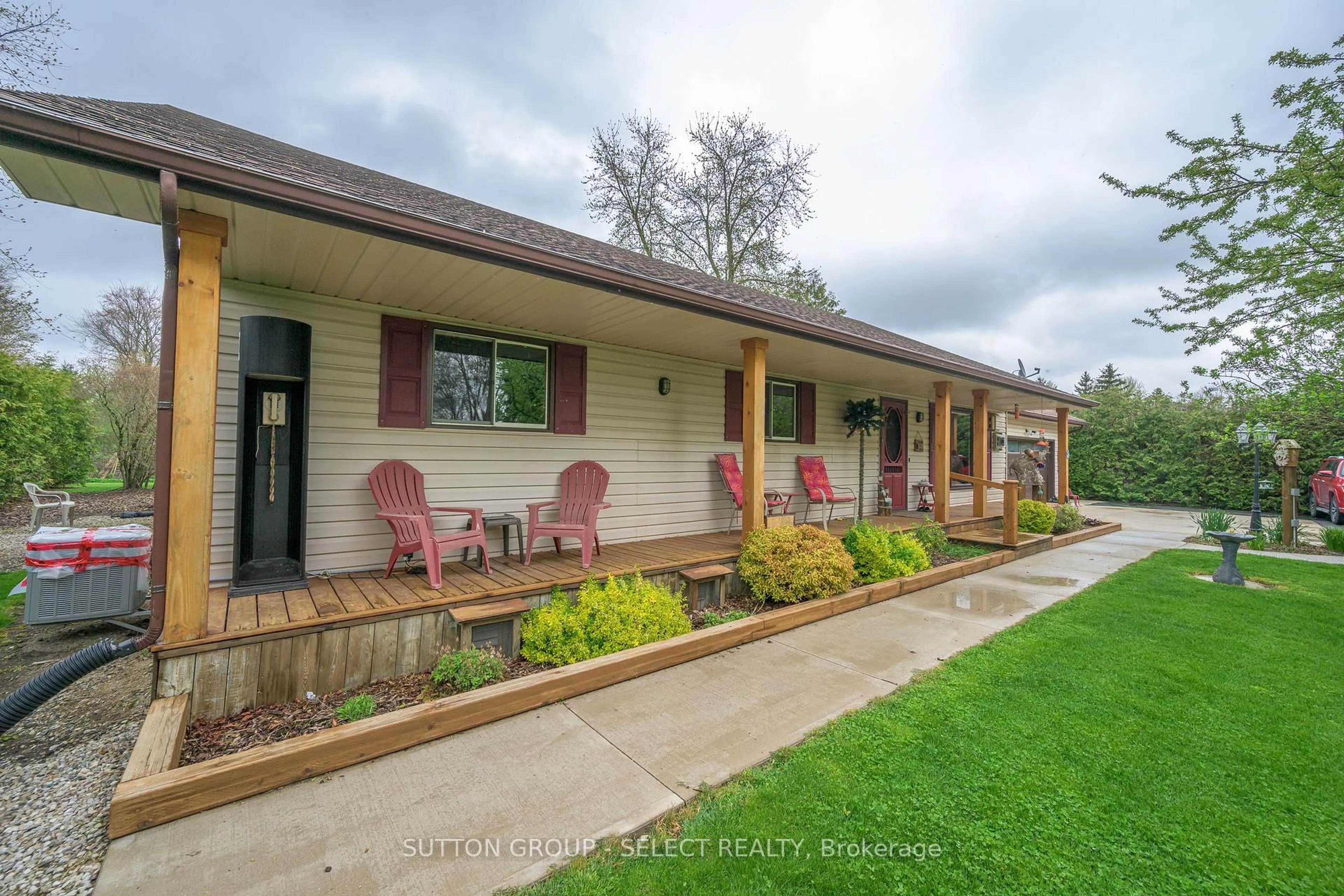 A pic from outside/outdoor area/front of a property/back of a property/a pic from drone, street for 8444 Lazy Lane, Lambton Shores Ontario N0M 2N0