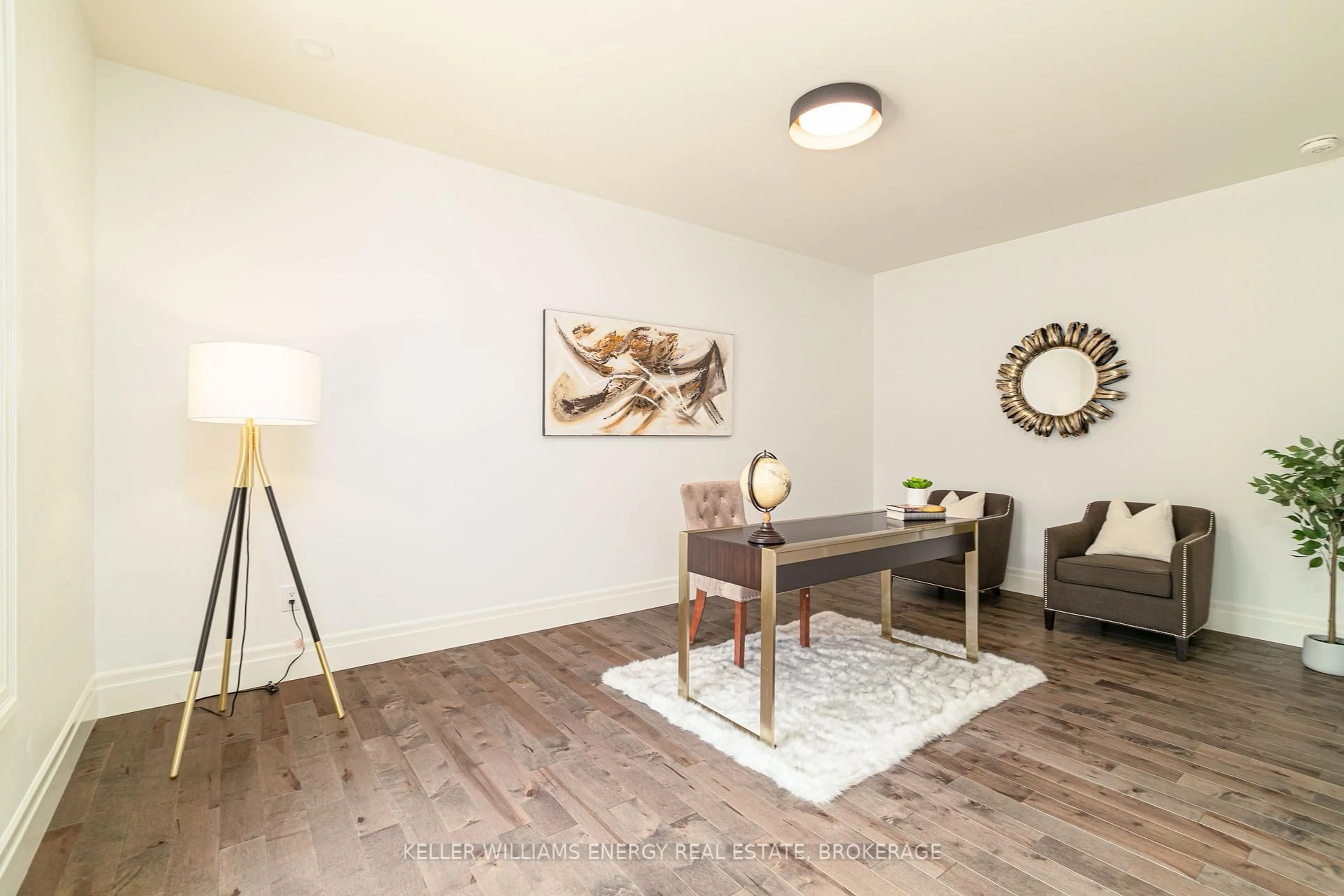 Living room with furniture, wood/laminate floor for 125 Villeneuve Dr, Prince Edward County Ontario K0K 2T0