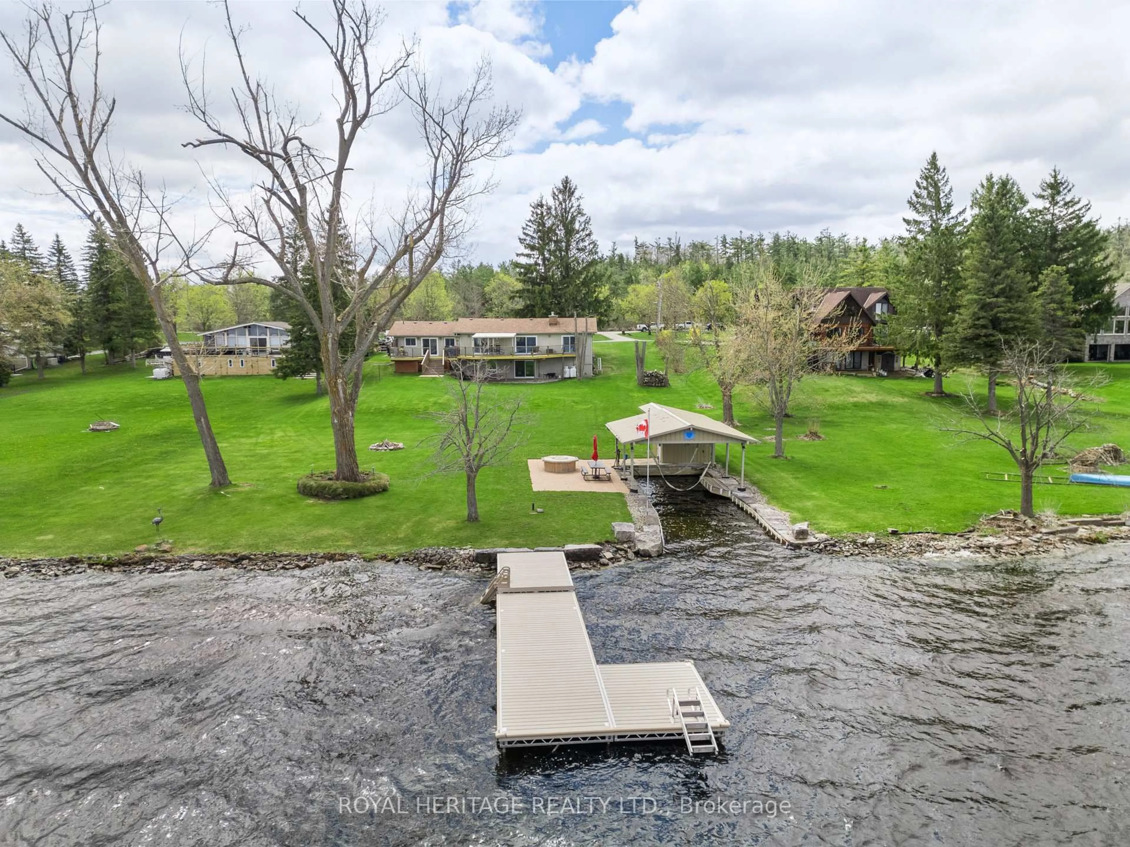 A pic from outside/outdoor area/front of a property/back of a property/a pic from drone, water/lake/river/ocean view for 7 North Service Rd, Kawartha Lakes Ontario K0M 1L0