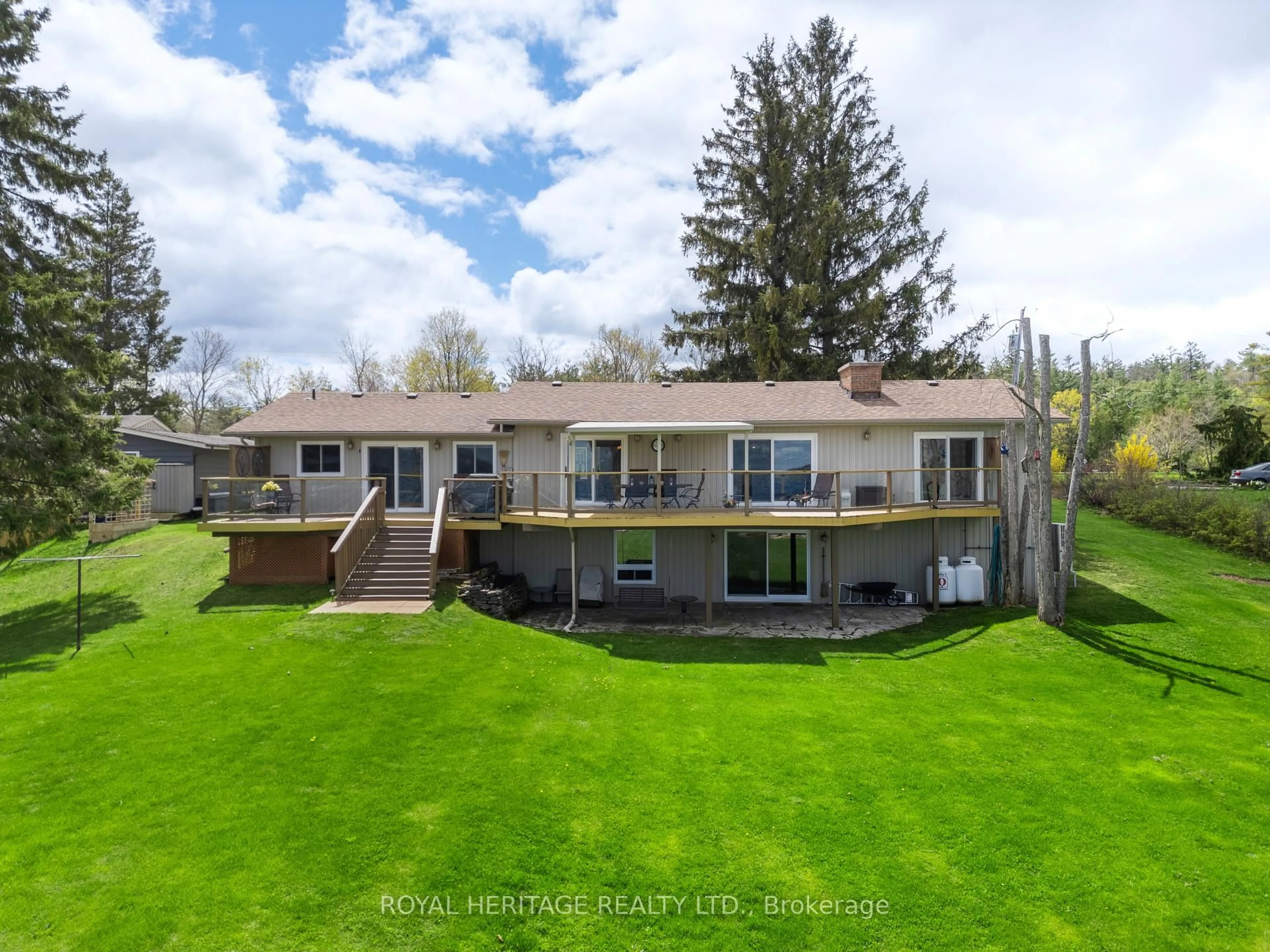 A pic from outside/outdoor area/front of a property/back of a property/a pic from drone, water/lake/river/ocean view for 7 North Service Rd, Kawartha Lakes Ontario K0M 1L0