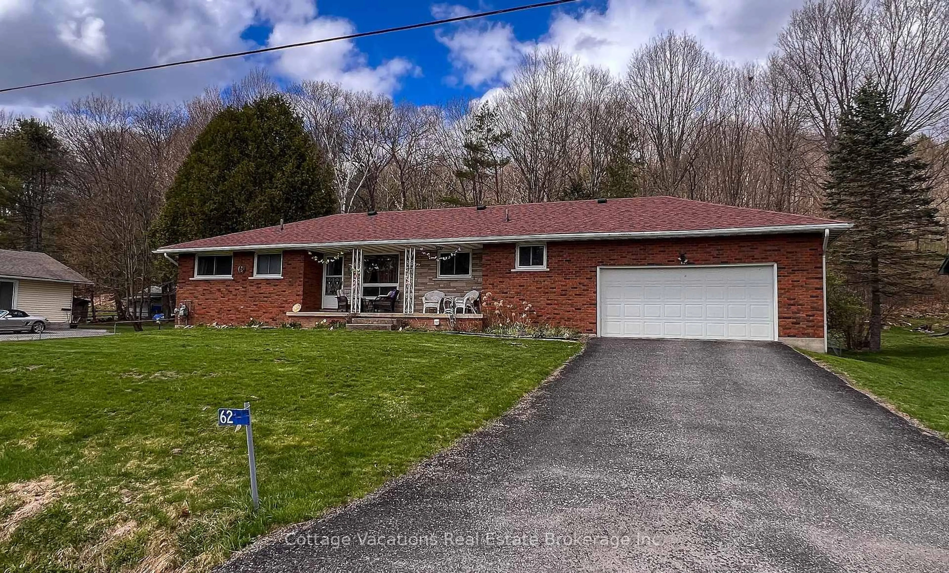 Home with brick exterior material, street for 62 Maple Heights Dr, Huntsville Ontario P1H 1R8