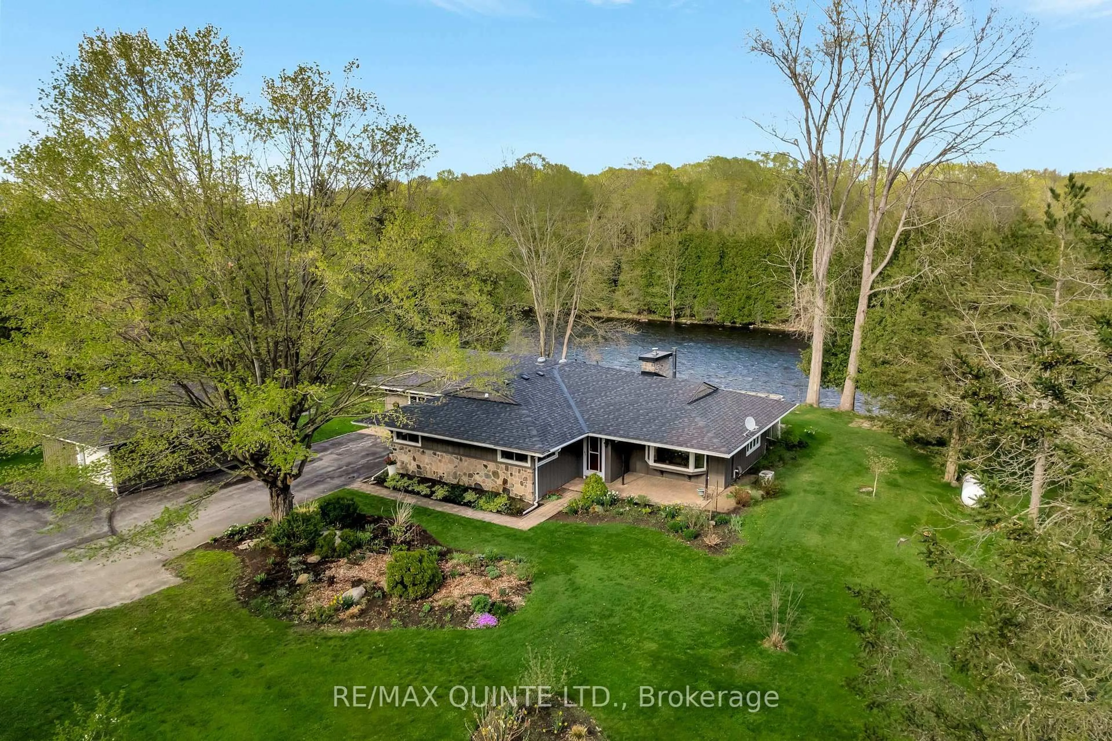 A pic from outside/outdoor area/front of a property/back of a property/a pic from drone, water/lake/river/ocean view for 150a Hoskin Rd, Belleville Ontario K0K 2V0