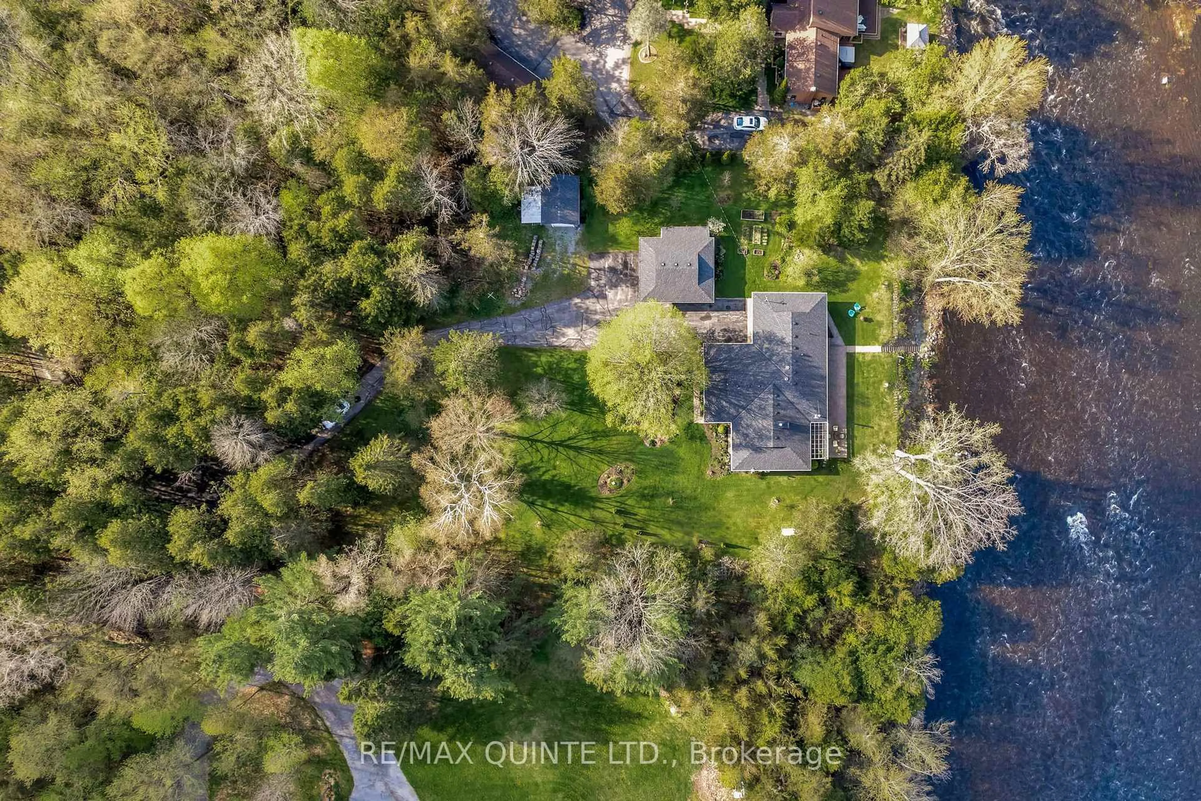 A pic from outside/outdoor area/front of a property/back of a property/a pic from drone, water/lake/river/ocean view for 150a Hoskin Rd, Belleville Ontario K0K 2V0