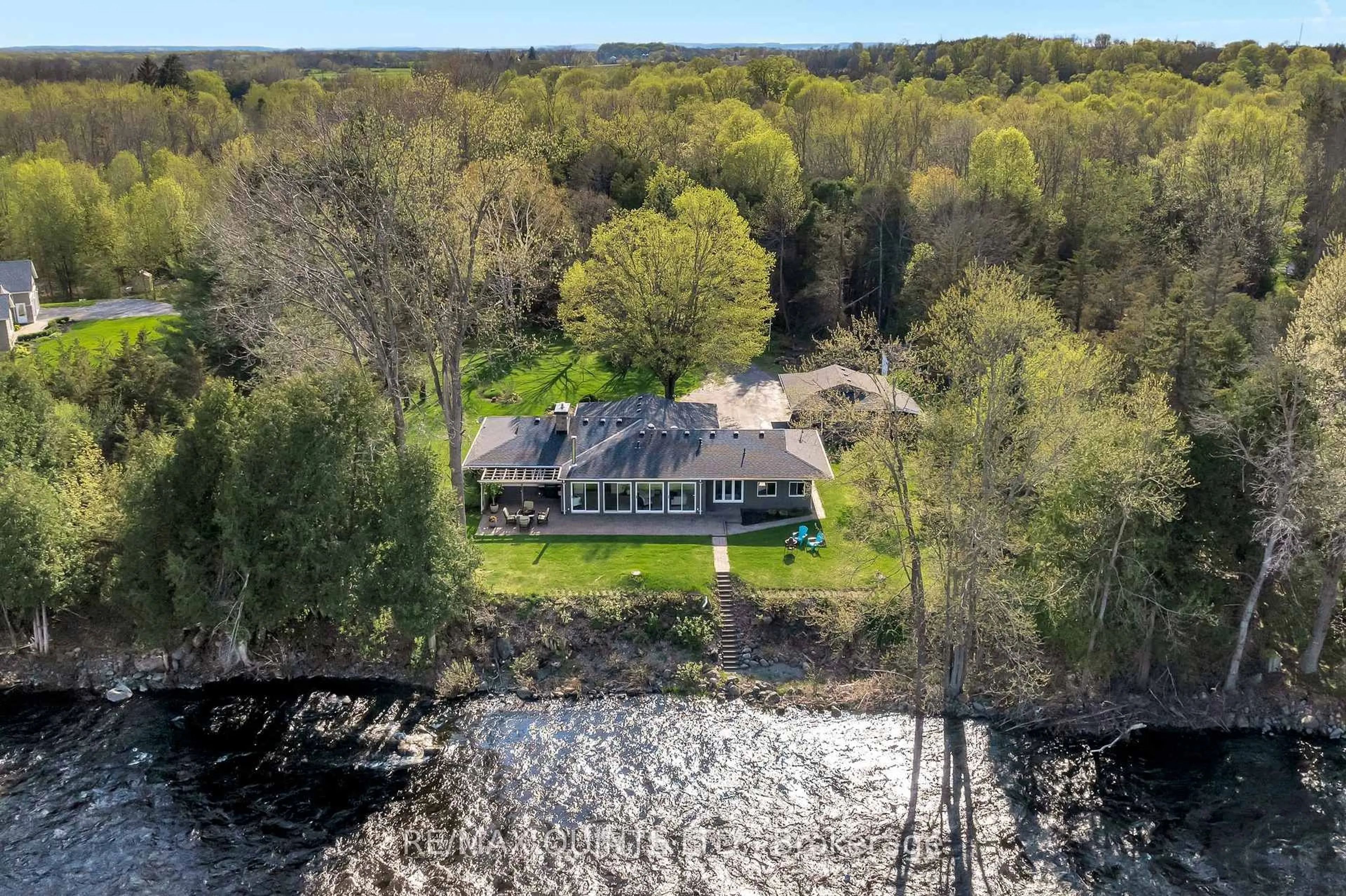 A pic from outside/outdoor area/front of a property/back of a property/a pic from drone, water/lake/river/ocean view for 150a Hoskin Rd, Belleville Ontario K0K 2V0