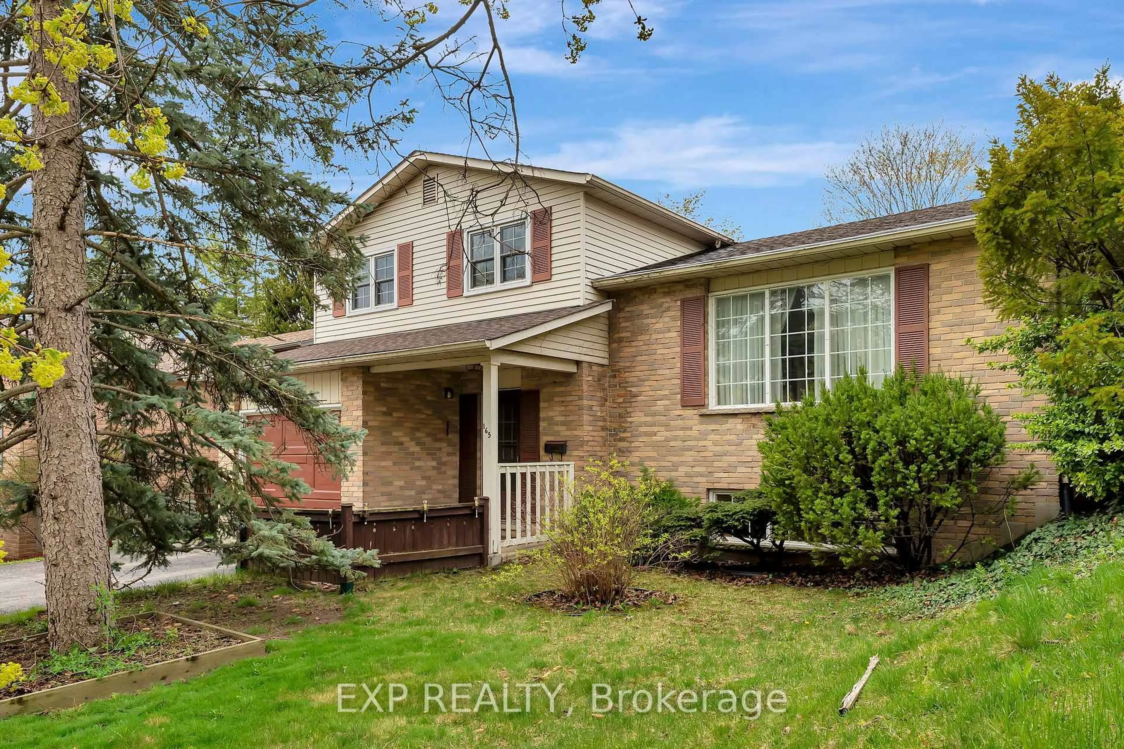 Home with brick exterior material, street for 165 Harvard Rd, Waterloo Ontario N2J 3V4