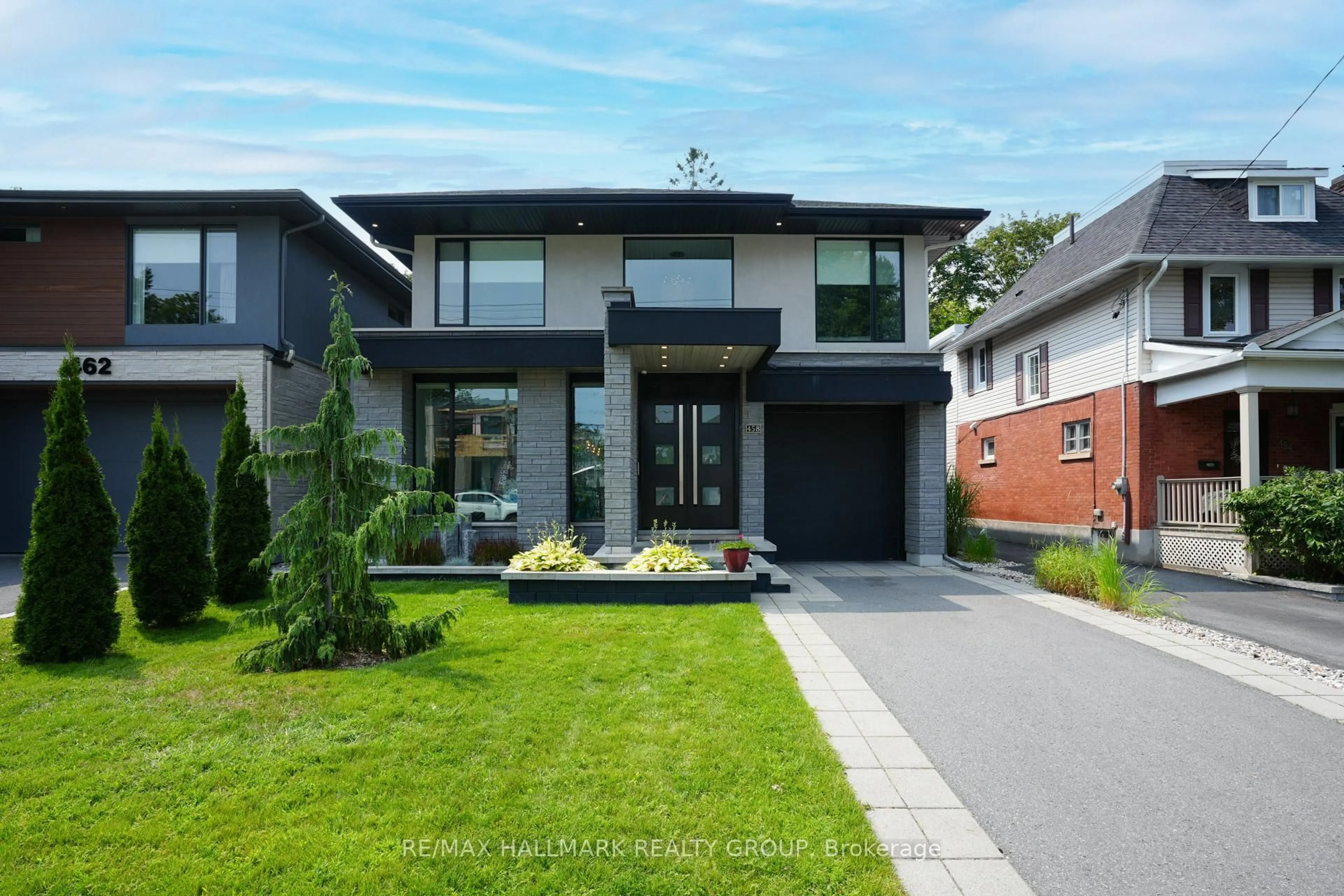 Home with brick exterior material, street for 458 TWEEDSMUIR Ave, Ottawa Ontario K1Z 5N9