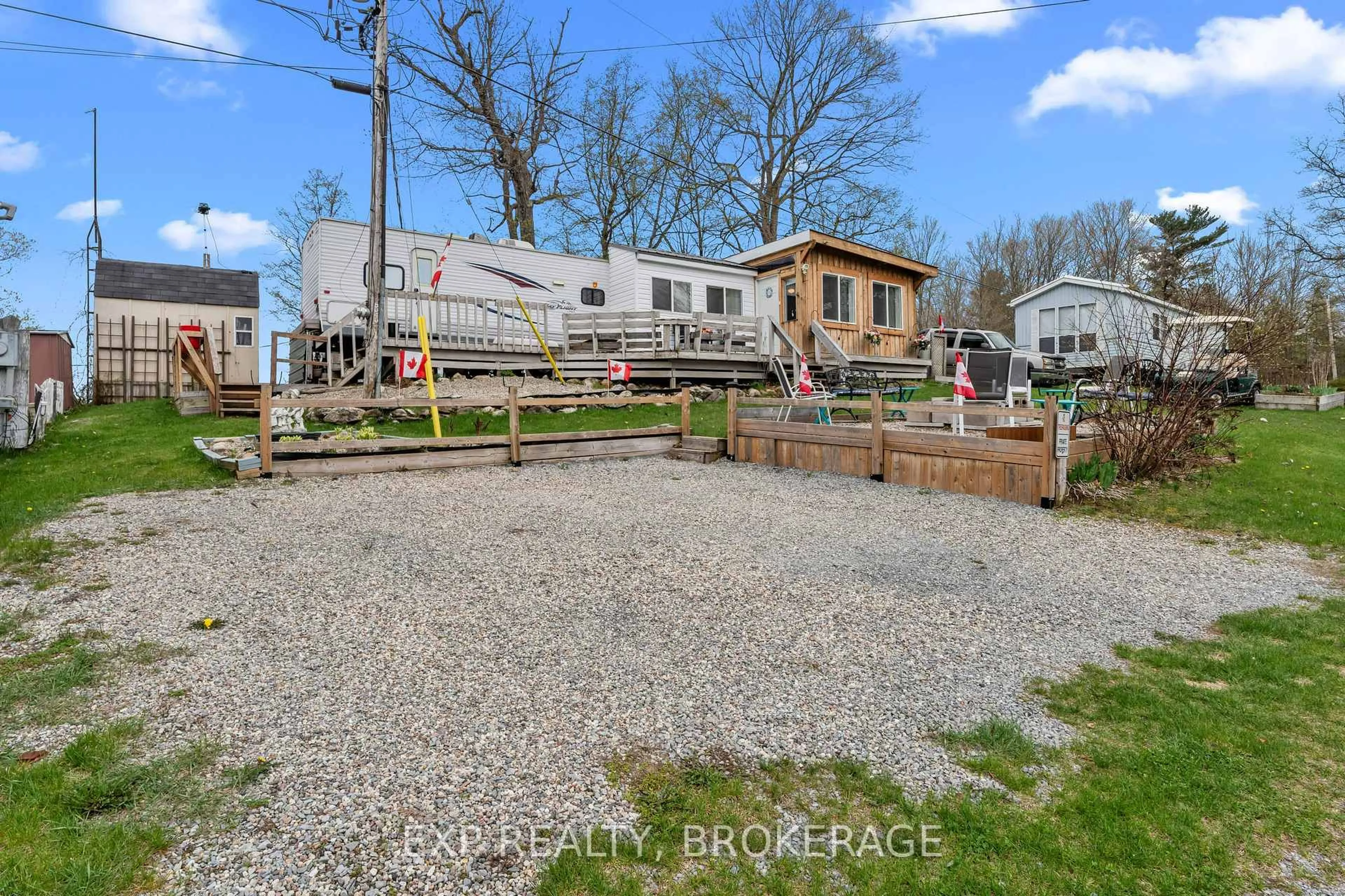 A pic from outside/outdoor area/front of a property/back of a property/a pic from drone, street for 9 GLENFORD Lane ##38, Godfrey Ontario K0H 1T0