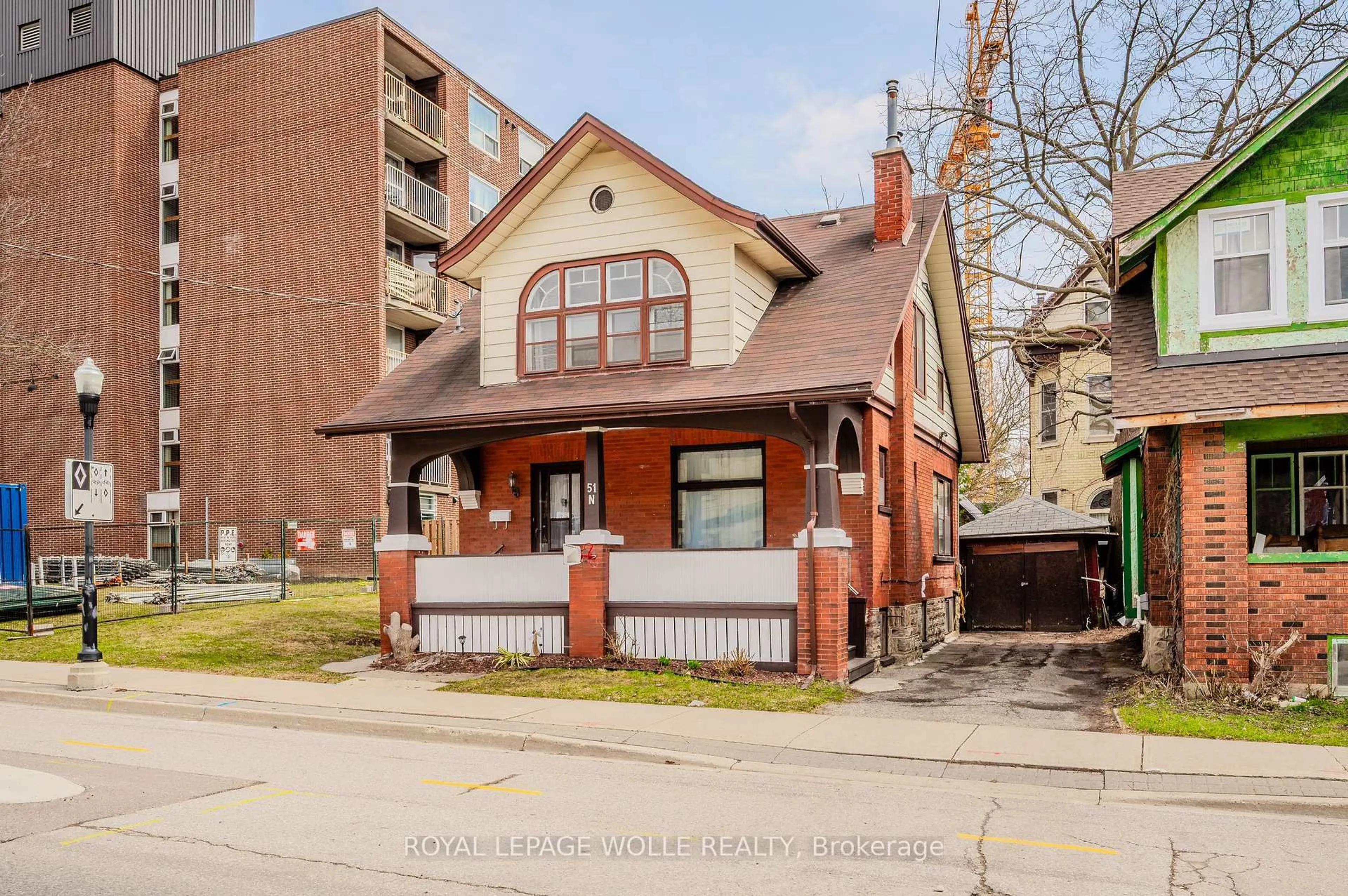 Home with brick exterior material, street for 51 Cedar St, Kitchener Ontario N2H 2W9