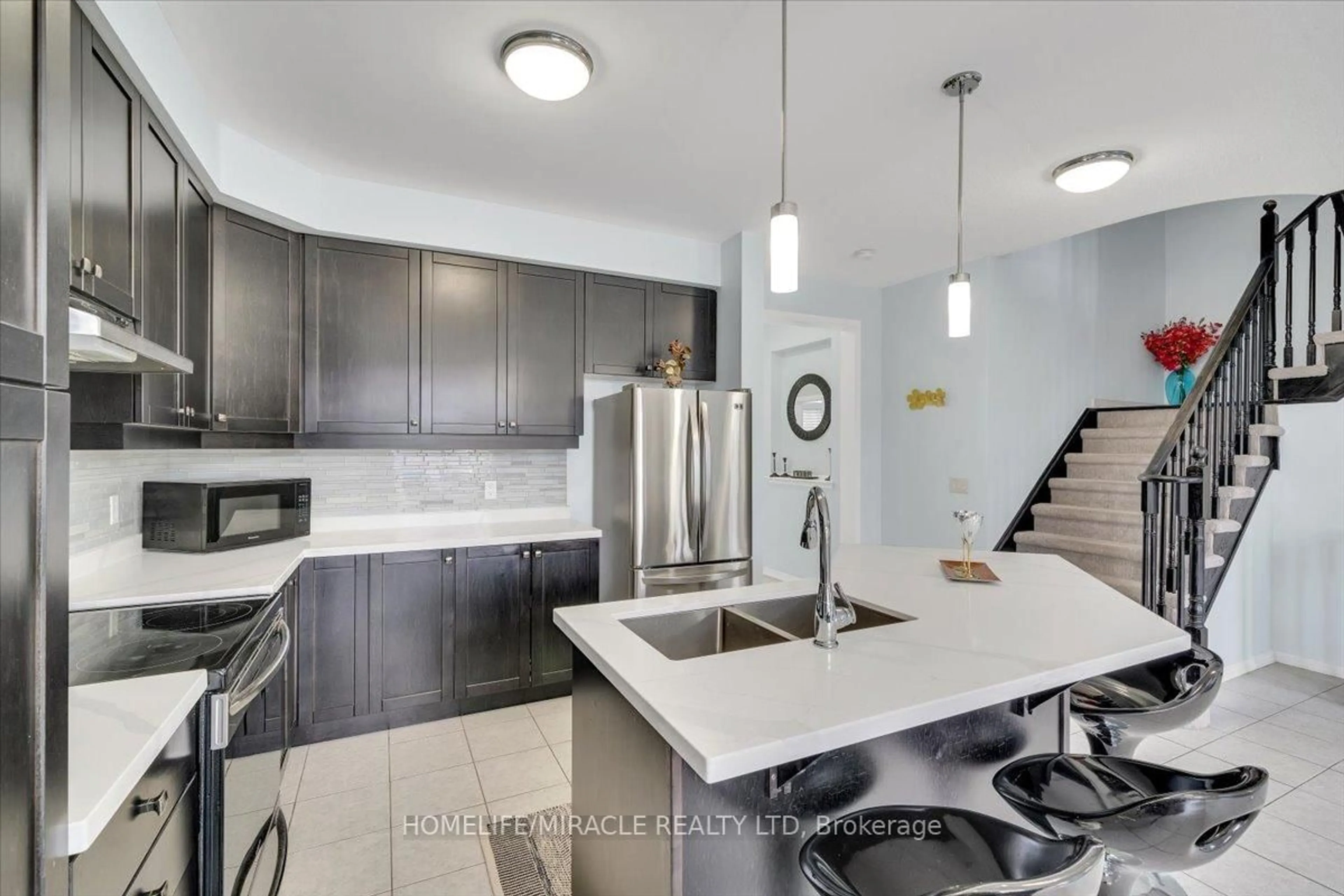 Open concept kitchen, ceramic/tile floor for 696 Fisher St, Cobourg Ontario K9A 0H3
