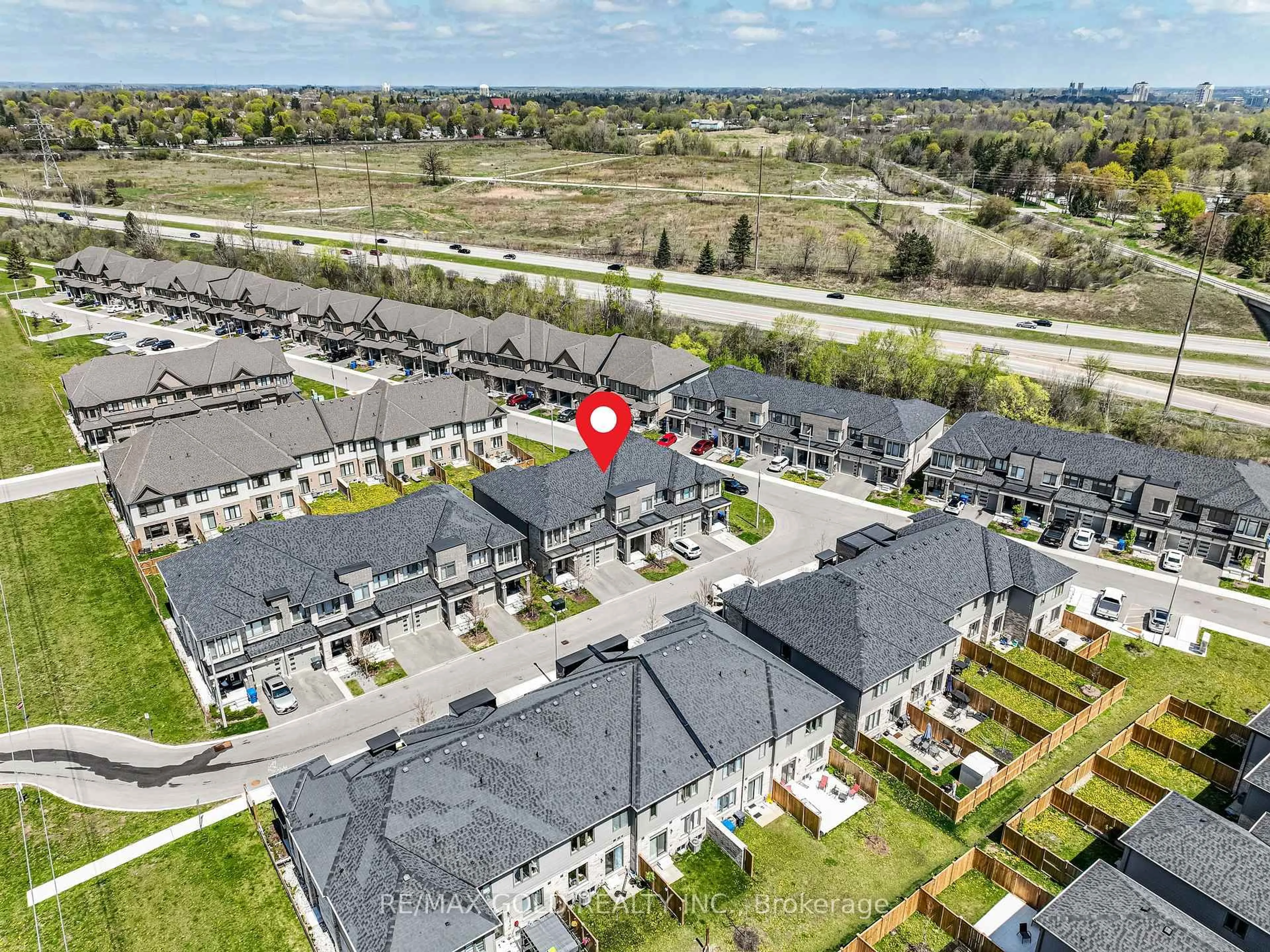 A pic from outside/outdoor area/front of a property/back of a property/a pic from drone, unknown for 166 Deerpath Dr #95, Guelph Ontario N1K 0E2