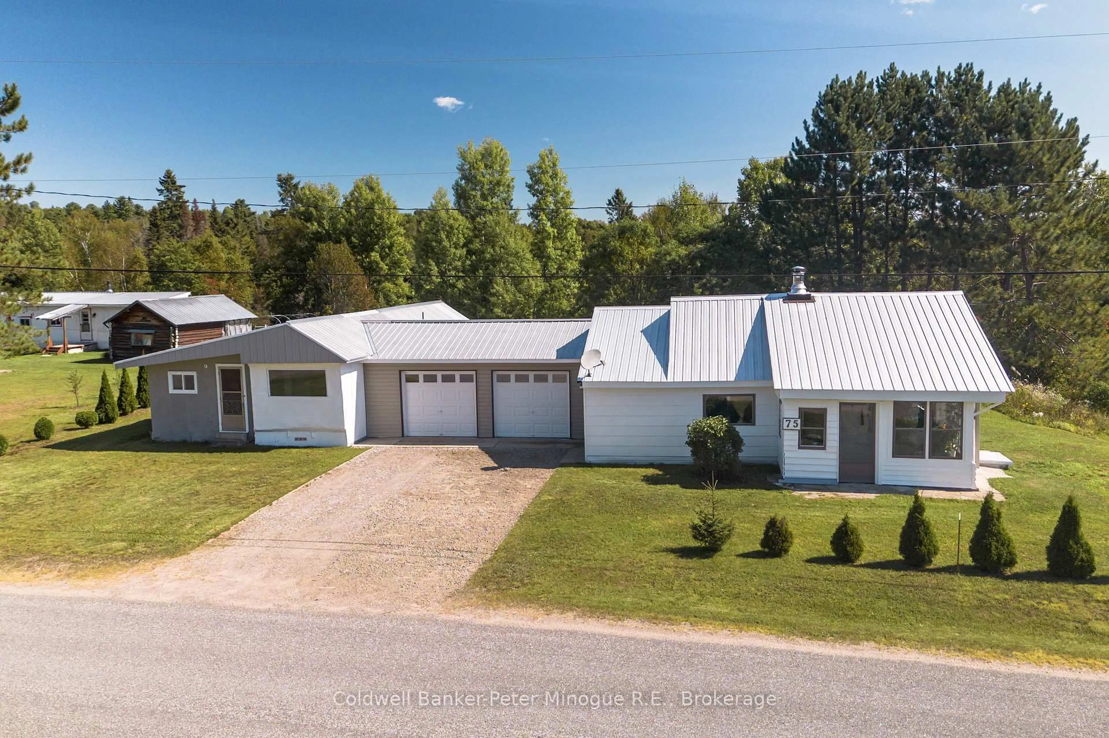 A pic from outside/outdoor area/front of a property/back of a property/a pic from drone, unknown for 75 North River Rd, Unorganized Townships Ontario P0H 2A0