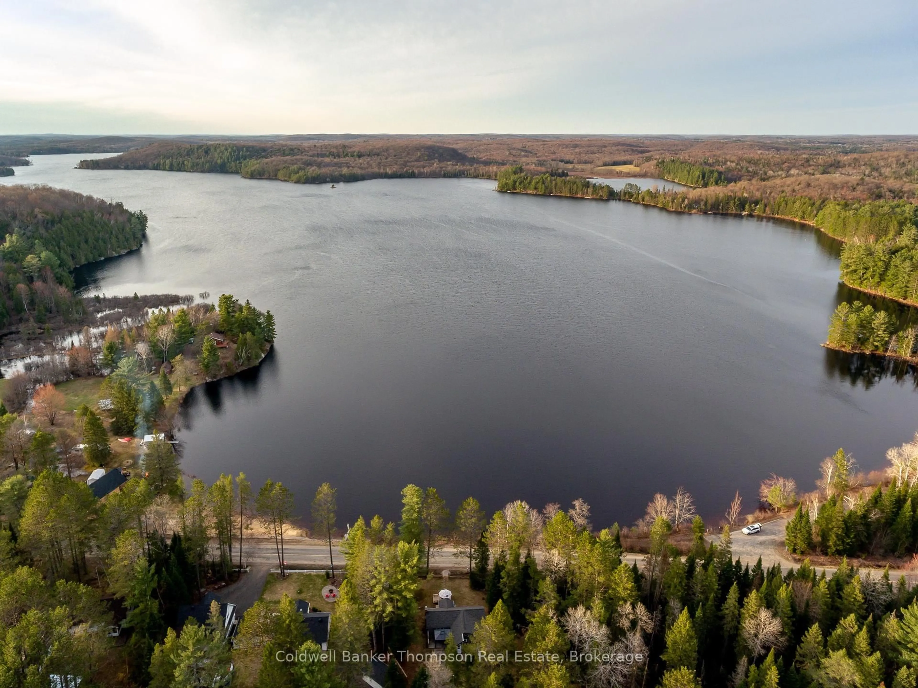 A pic from outside/outdoor area/front of a property/back of a property/a pic from drone, water/lake/river/ocean view for 4205 Ravenscliffe Rd, Huntsville Ontario P1H 2J2