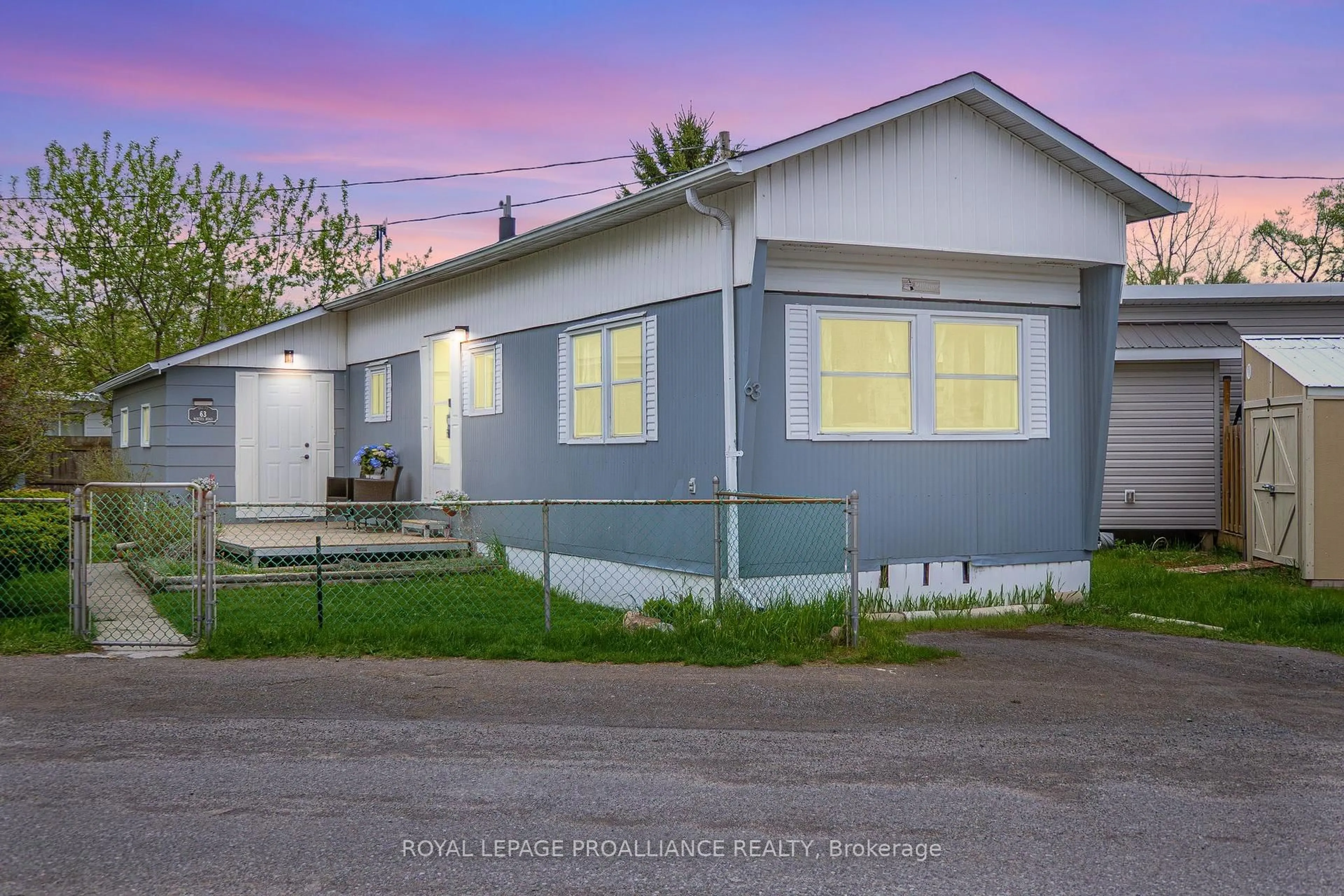 Home with vinyl exterior material, street for 63 Whites Rd #63, Quinte West Ontario K8V 5P5