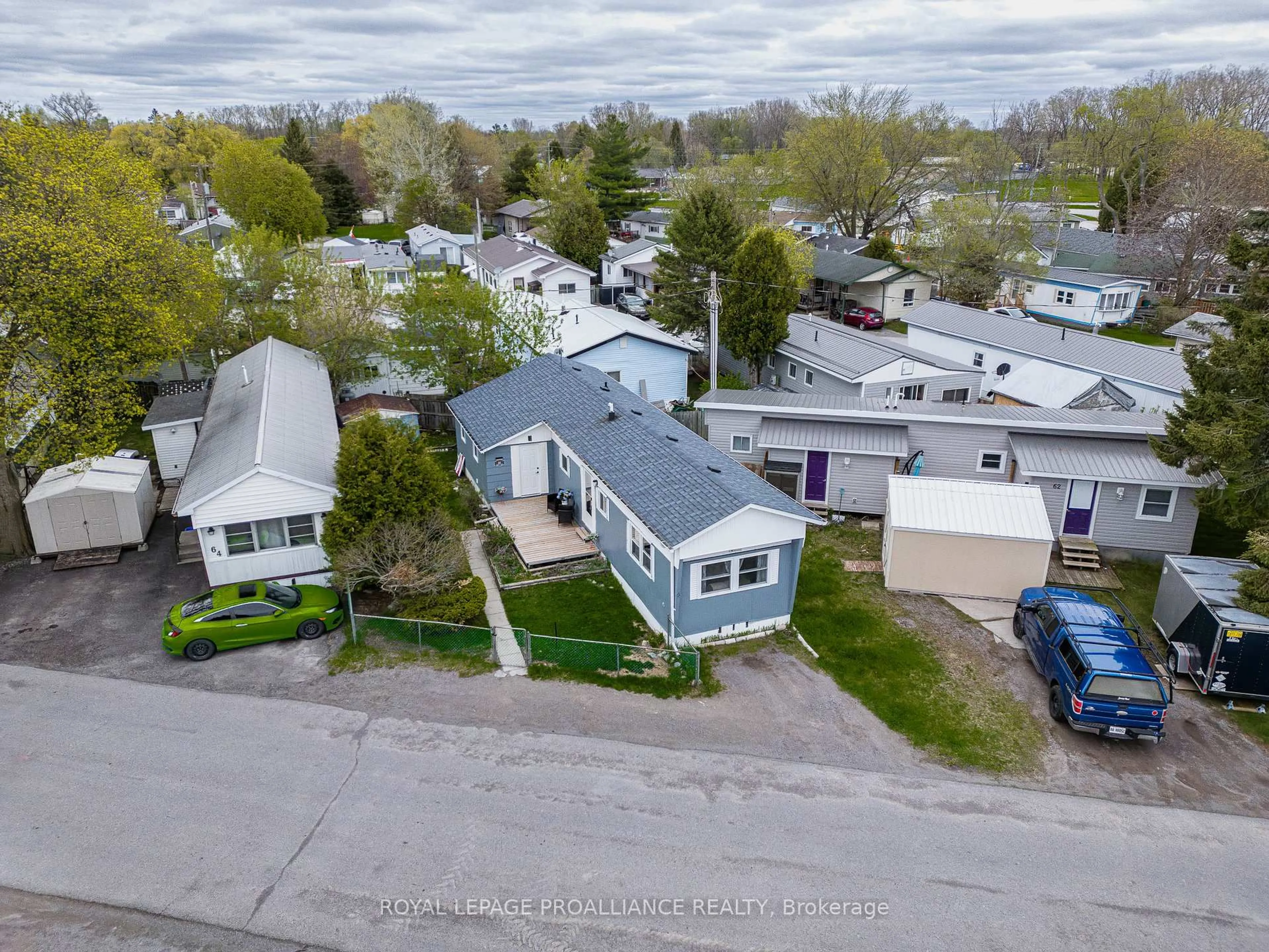 A pic from outside/outdoor area/front of a property/back of a property/a pic from drone, street for 63 Whites Rd #63, Quinte West Ontario K8V 5P5