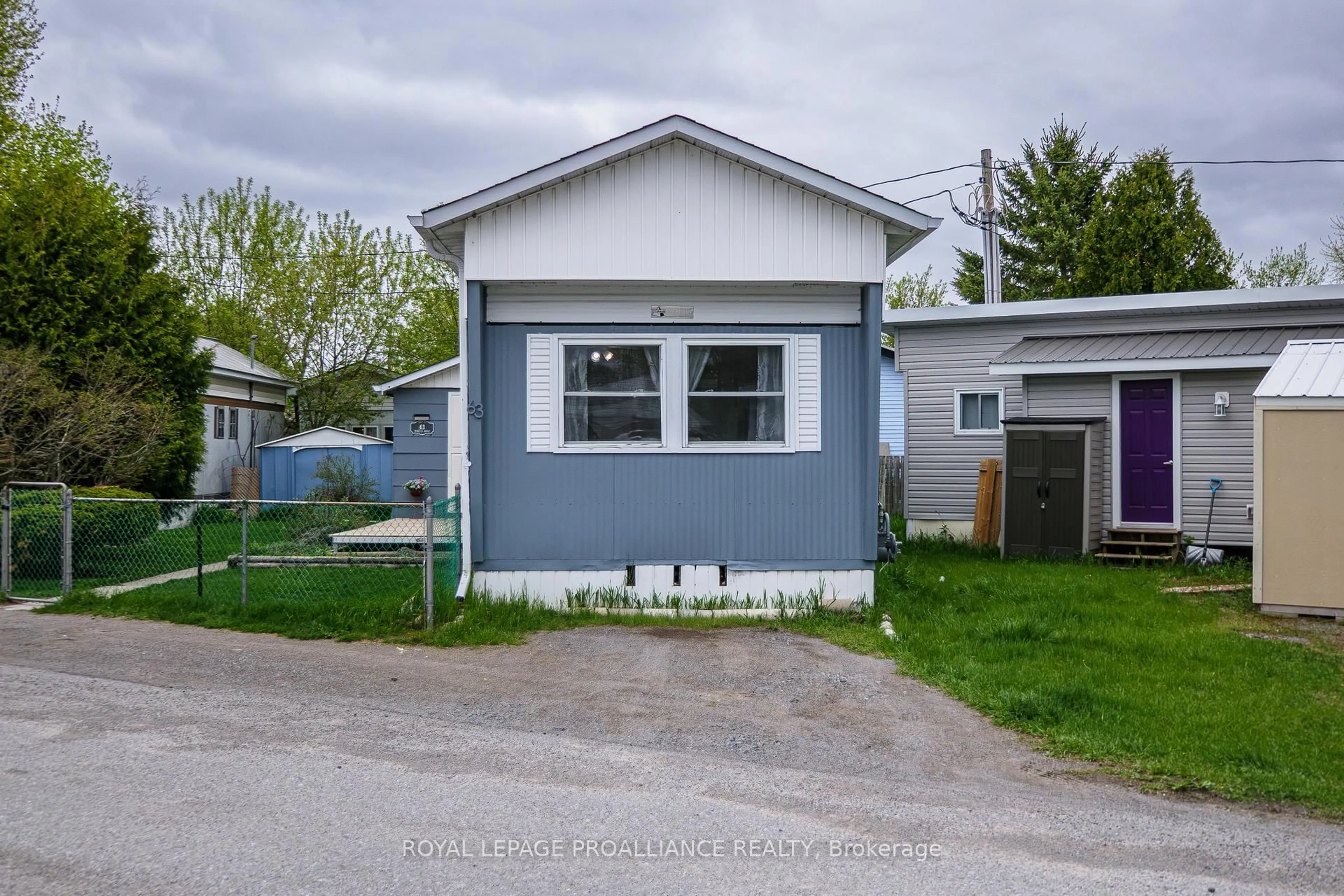 Home with vinyl exterior material, street for 63 Whites Rd #63, Quinte West Ontario K8V 5P5