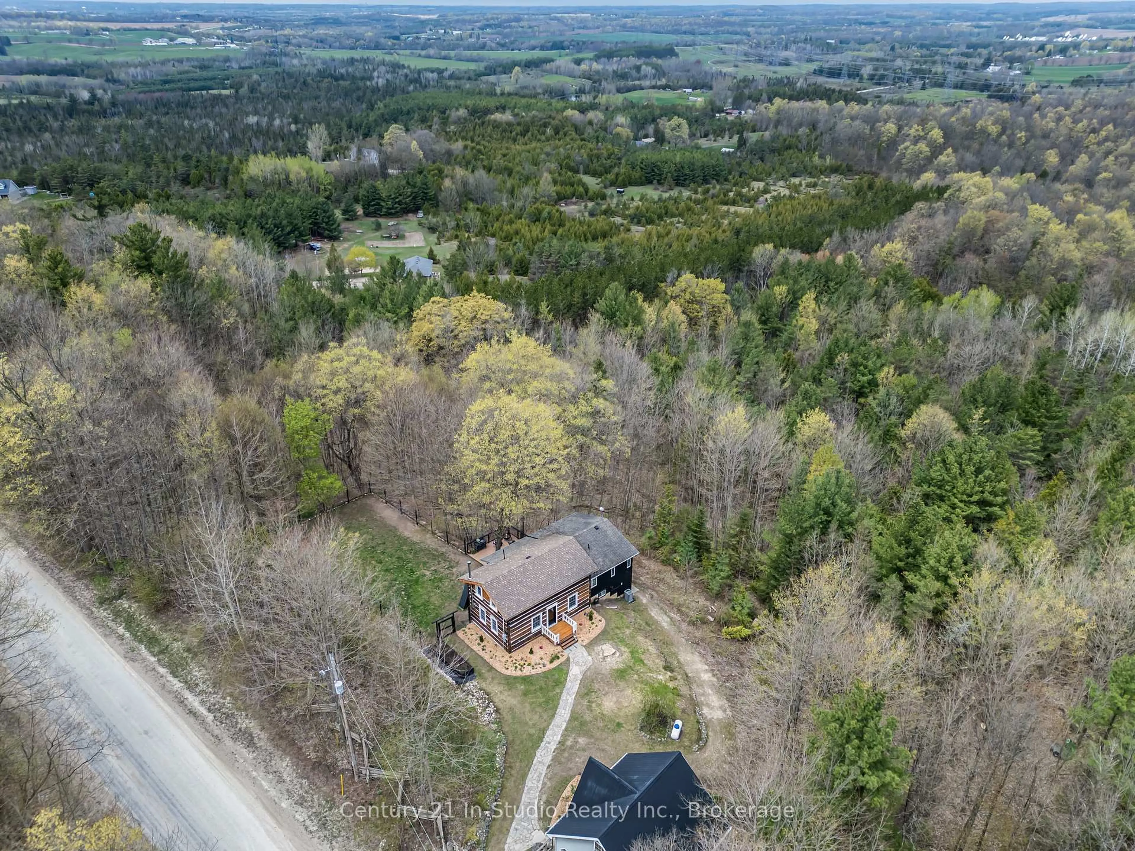 A pic from outside/outdoor area/front of a property/back of a property/a pic from drone, forest/trees view for 302051 Concession 2 SDR N/A, West Grey Ontario N4N 3B8