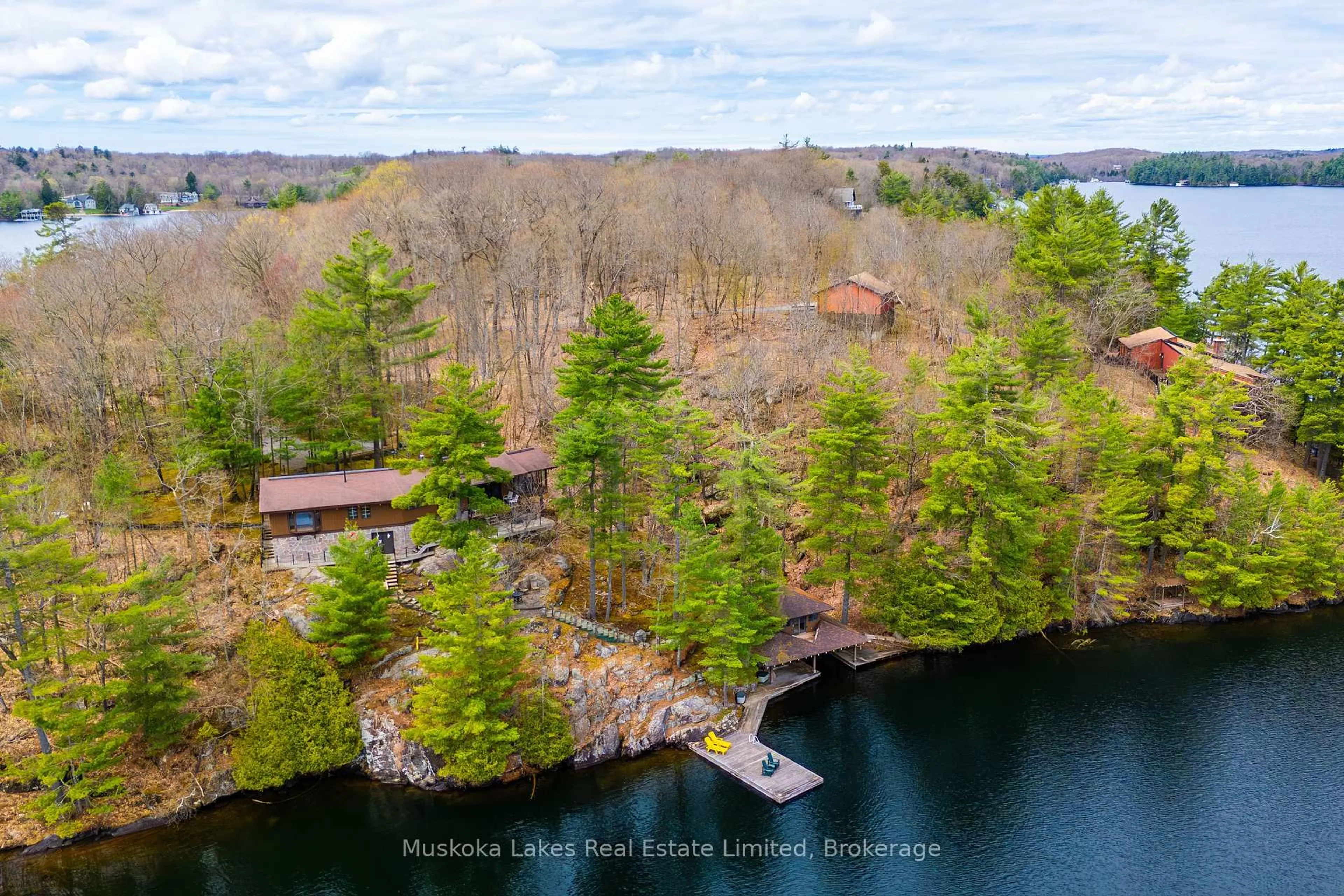 A pic from outside/outdoor area/front of a property/back of a property/a pic from drone, water/lake/river/ocean view for 1344 Peninsula Rd, Muskoka Lakes Ontario P0B 1J0