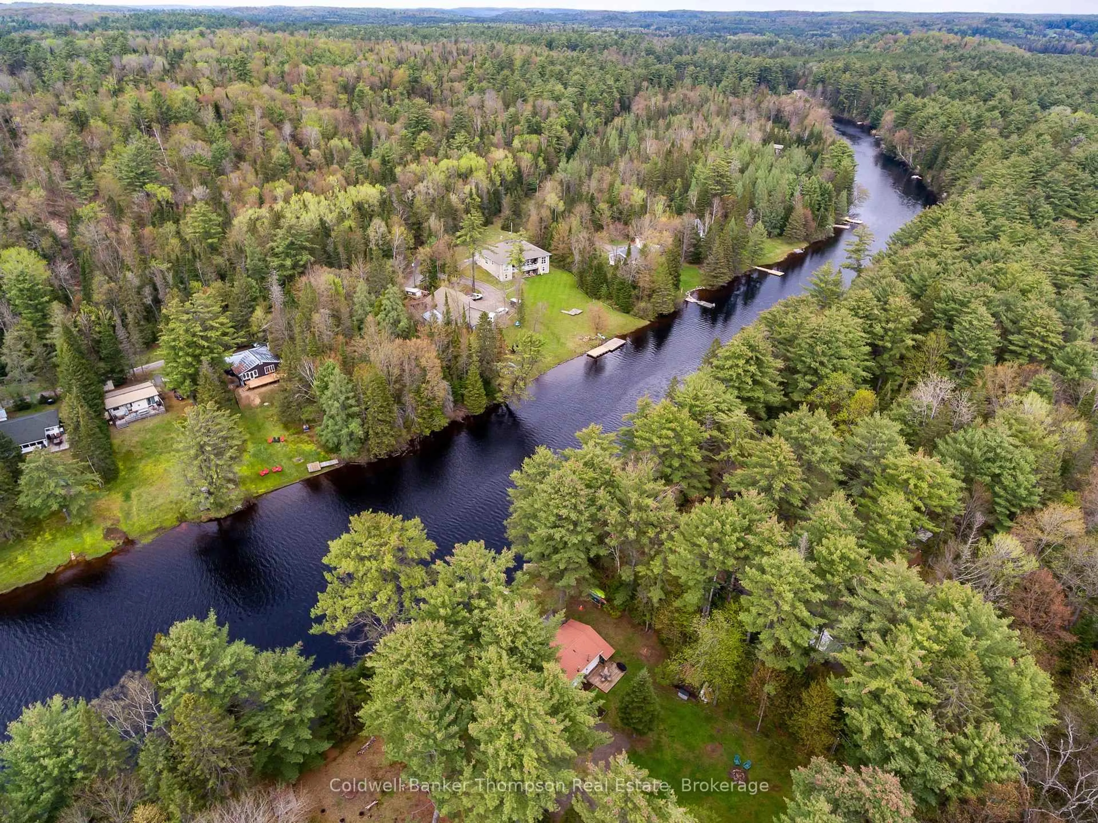 A pic from outside/outdoor area/front of a property/back of a property/a pic from drone, water/lake/river/ocean view for 553 BALSAM CHUTES Rd, Huntsville Ontario P0B 1L0