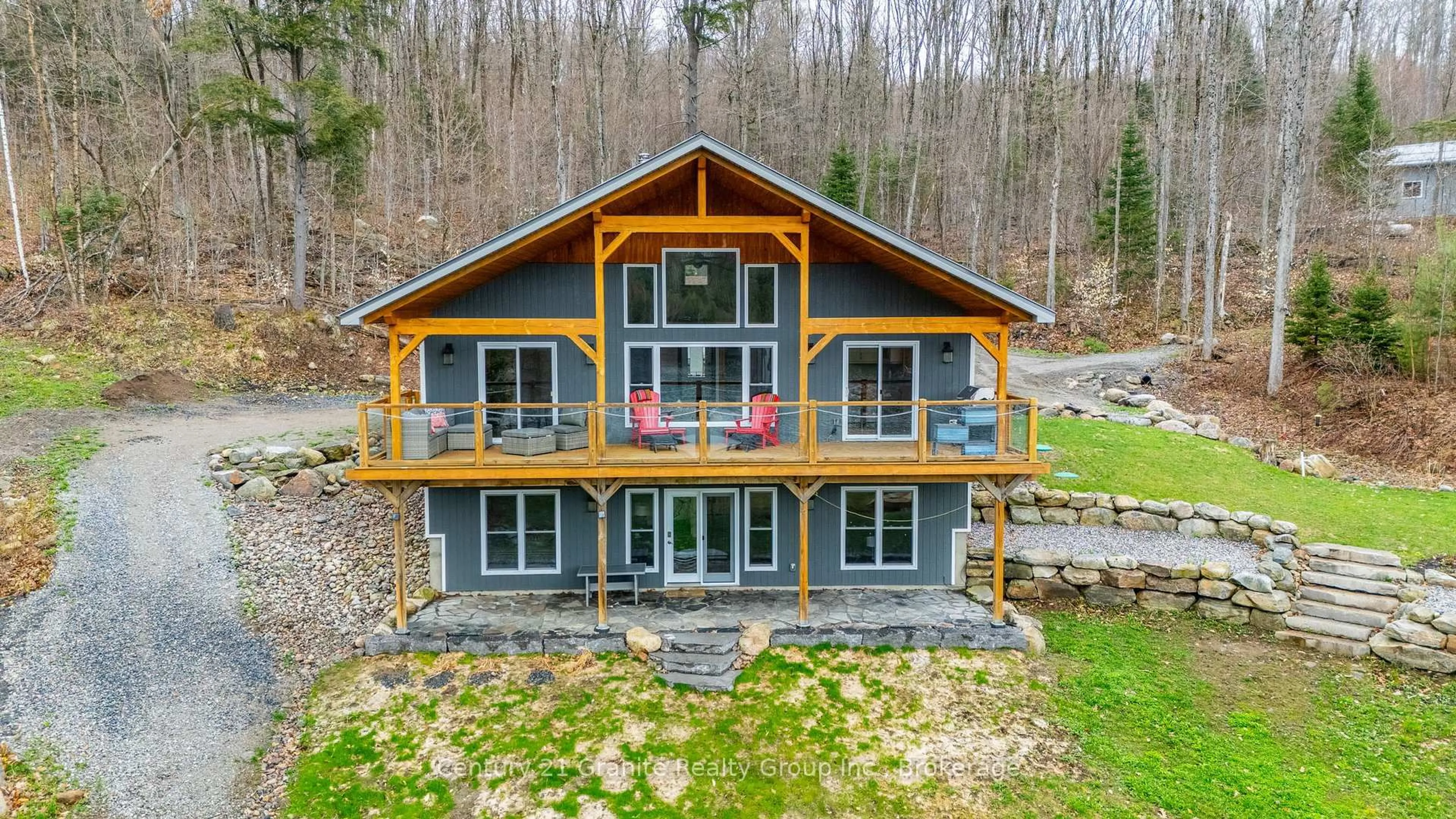 A pic from outside/outdoor area/front of a property/back of a property/a pic from drone, unknown for 1004 Lancer Lane, Dysart et al Ontario K0M 1S0