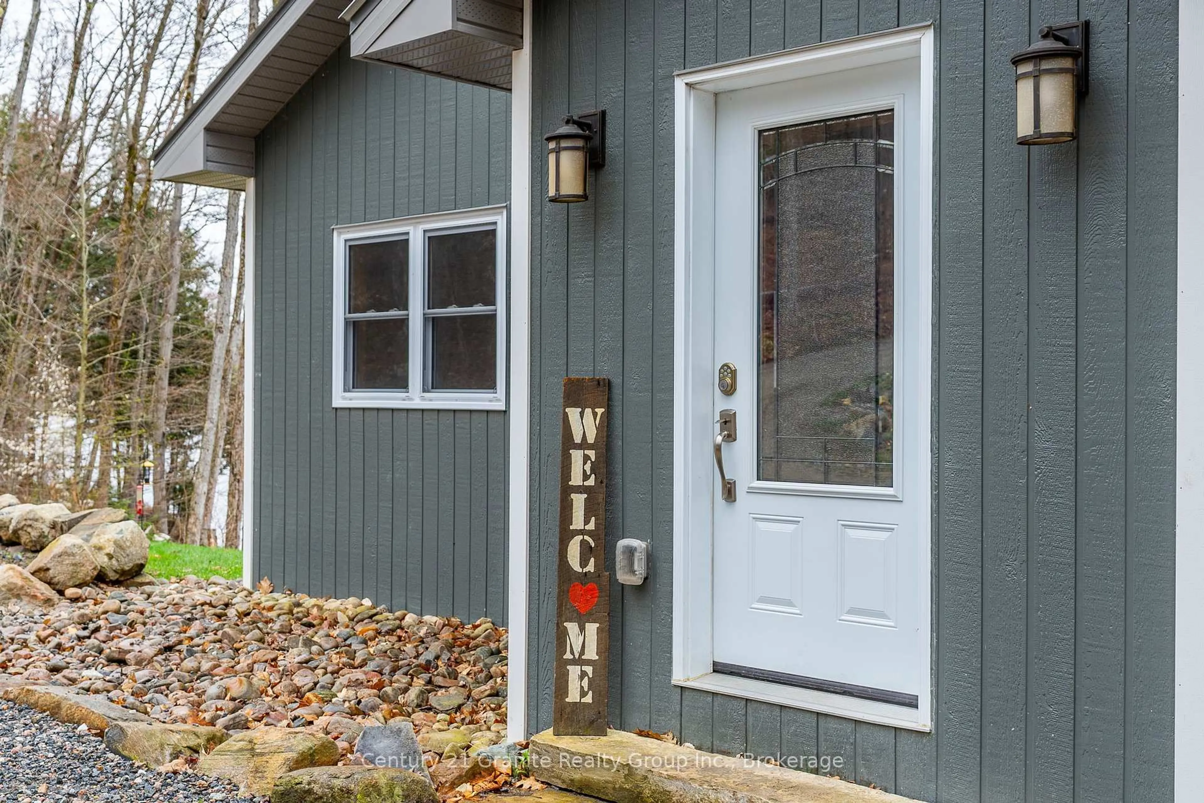 Home with vinyl exterior material, street for 1004 Lancer Lane, Dysart et al Ontario K0M 1S0