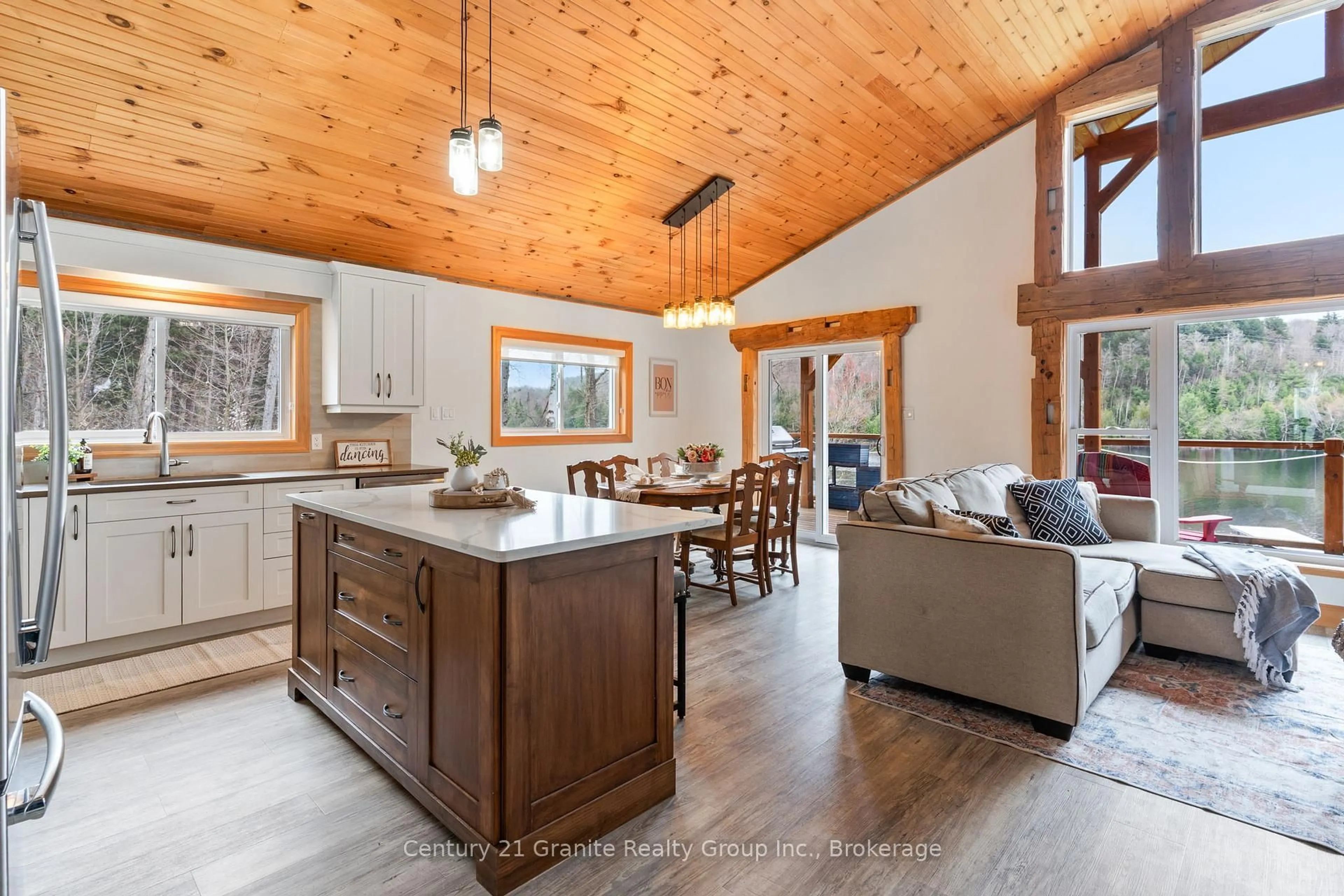 Open concept kitchen, wood/laminate floor for 1004 Lancer Lane, Dysart et al Ontario K0M 1S0