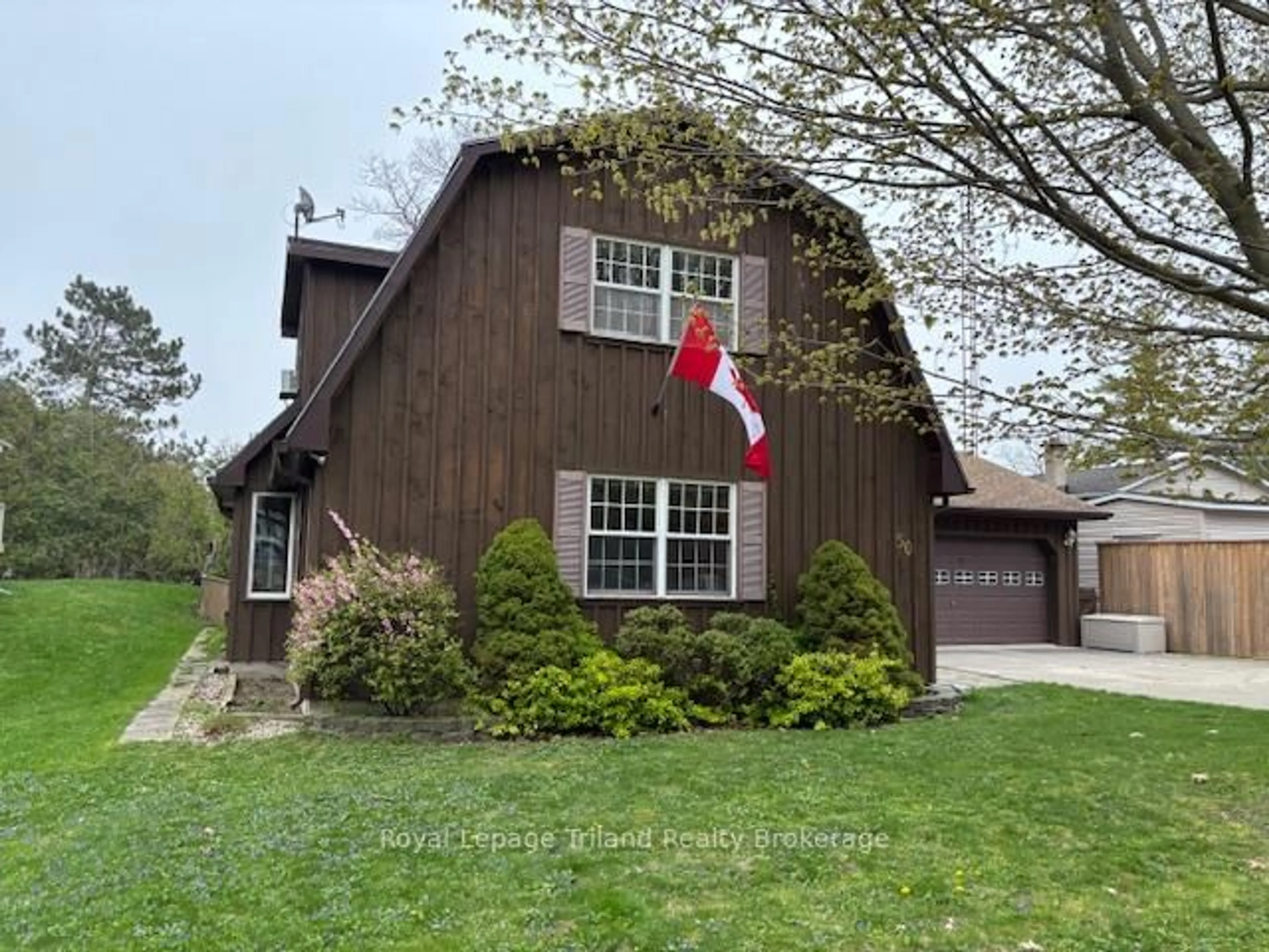 Home with vinyl exterior material, street for 50 Warwick Ave, Lambton Shores Ontario N0M 1T0