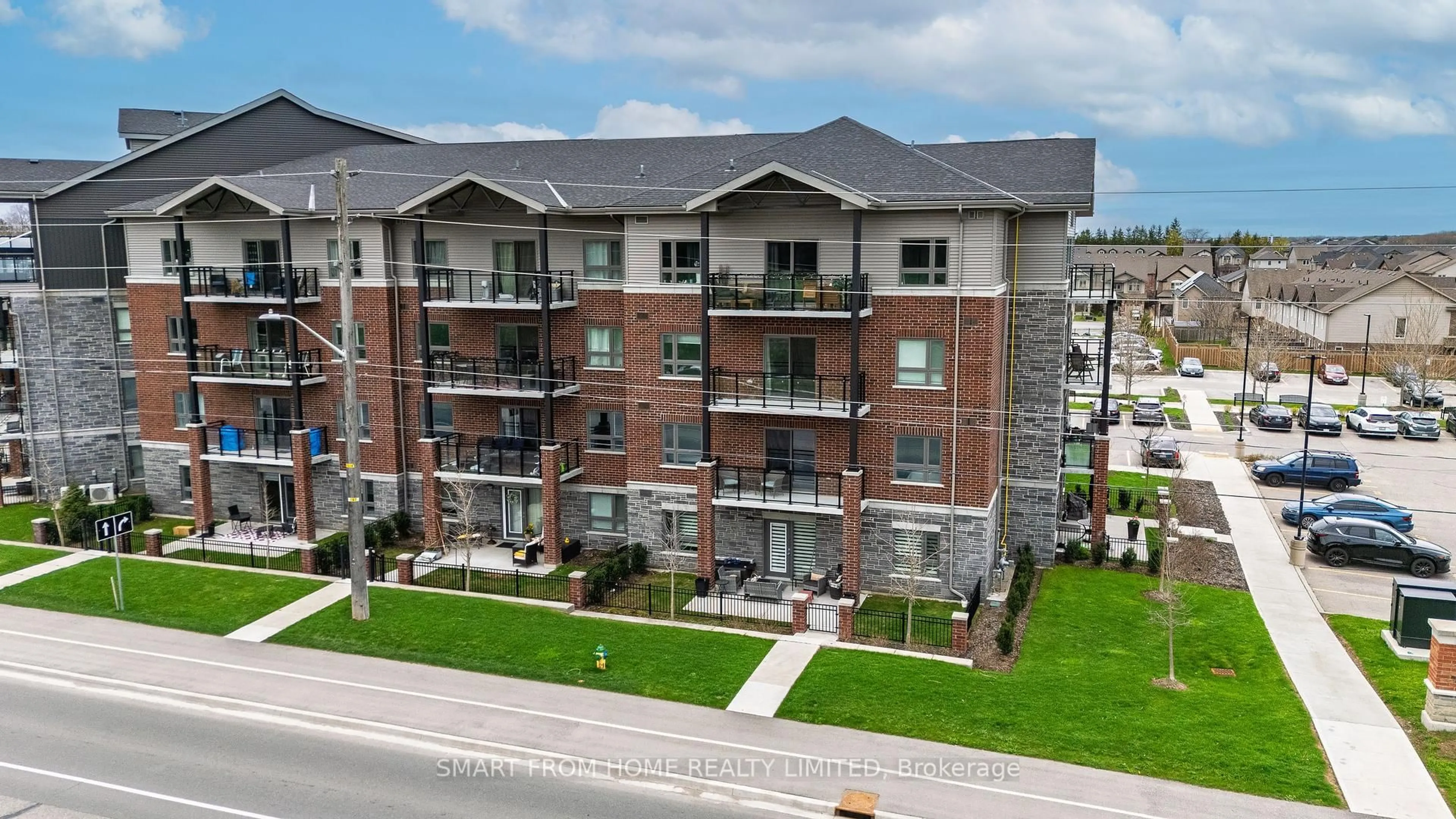 A pic from outside/outdoor area/front of a property/back of a property/a pic from drone, building for 35 Kingsbury Sq #202, Guelph Ontario N1L 1B5