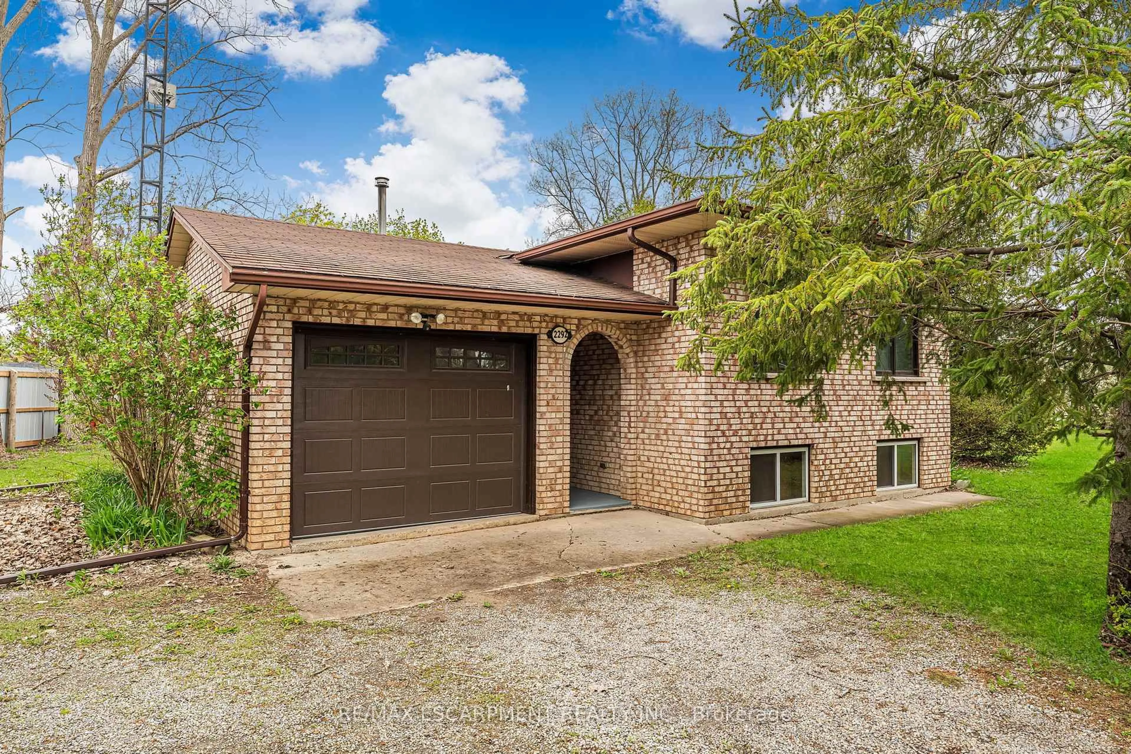 Home with brick exterior material, street for 2292 Caistor Centre Rd, West Lincoln Ontario L0R 1E0